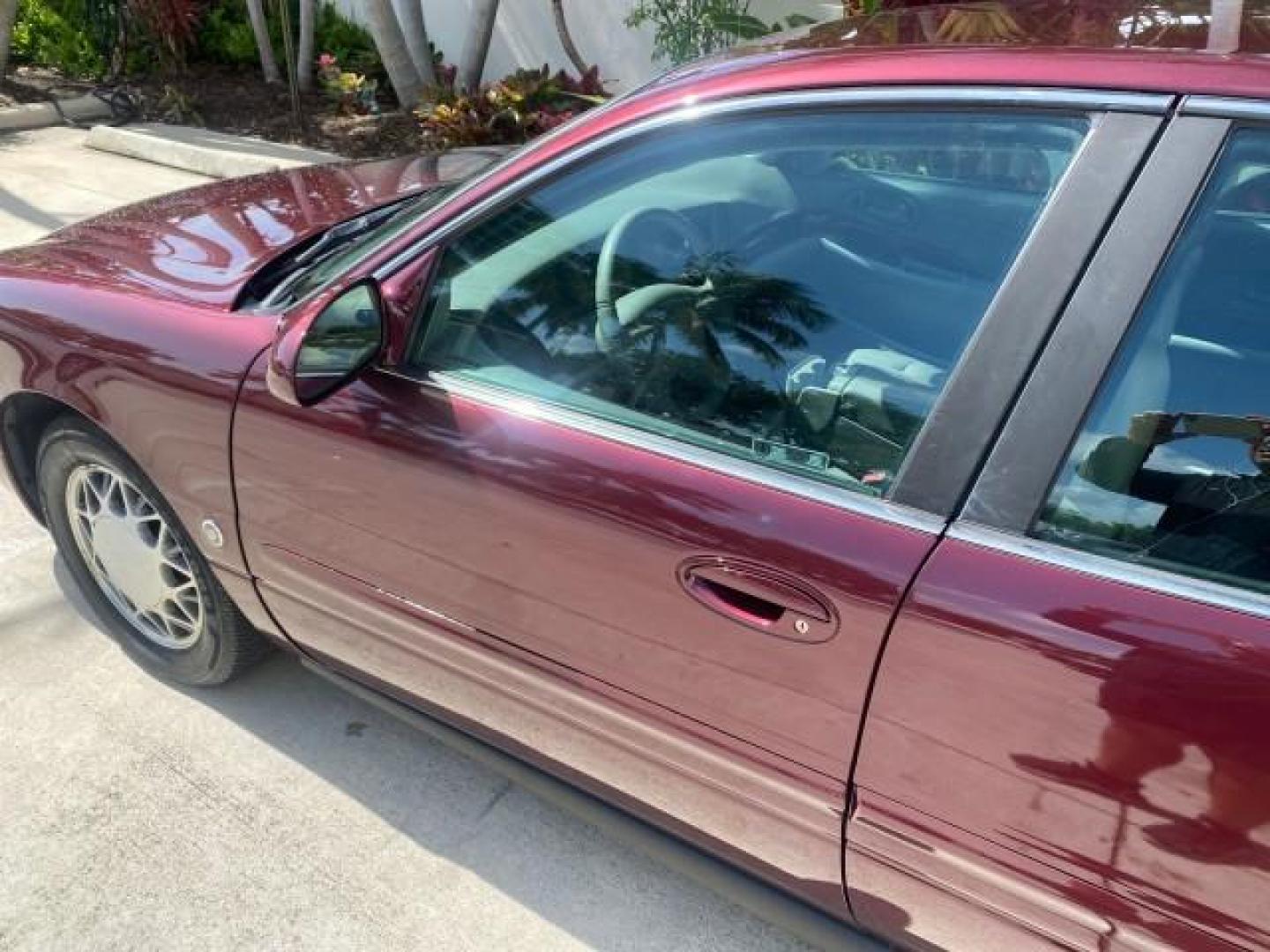 2003 Cabernet Red Metallic /Medium Gray Buick LeSabre Limited 1 OWNER FL LOW MILES 72,247 (1G4HR54KX3U) with an 3.8L 3800 V6 SFI Engine engine, Automatic transmission, located at 4701 North Dixie Hwy, Pompano Beach, FL, 33064, (954) 422-2889, 26.240938, -80.123474 - OUR WEBPAGE FLORIDACARS1.COM HAS OVER 100 PHOTOS AND FREE CARFAX LINK 2003 BUICK LESABRE LIMITED $ 31,795 NEW VIN: 1G4HR54KX3U187919 1 G 4 H R 5 4 K X 3 U 1 8 7 9 1 9 SEDAN 4 DR 3.8L V6 F 12V GASOLINE 29 MPG FRONT WHEEL DRIVE Top Features Alloy Wheels Front Seat Heaters Leather Seats Rear Seat Heate - Photo#27