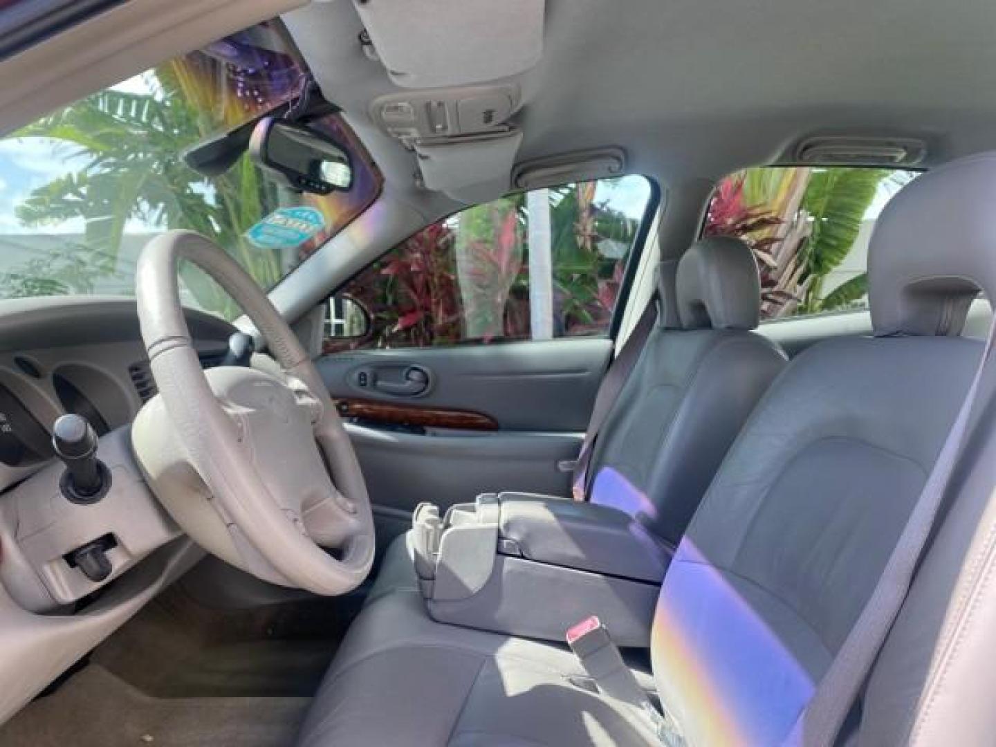 2003 Cabernet Red Metallic /Medium Gray Buick LeSabre Limited 1 OWNER FL LOW MILES 72,247 (1G4HR54KX3U) with an 3.8L 3800 V6 SFI Engine engine, Automatic transmission, located at 4701 North Dixie Hwy, Pompano Beach, FL, 33064, (954) 422-2889, 26.240938, -80.123474 - OUR WEBPAGE FLORIDACARS1.COM HAS OVER 100 PHOTOS AND FREE CARFAX LINK 2003 BUICK LESABRE LIMITED $ 31,795 NEW VIN: 1G4HR54KX3U187919 1 G 4 H R 5 4 K X 3 U 1 8 7 9 1 9 SEDAN 4 DR 3.8L V6 F 12V GASOLINE 29 MPG FRONT WHEEL DRIVE Top Features Alloy Wheels Front Seat Heaters Leather Seats Rear Seat Heate - Photo#35