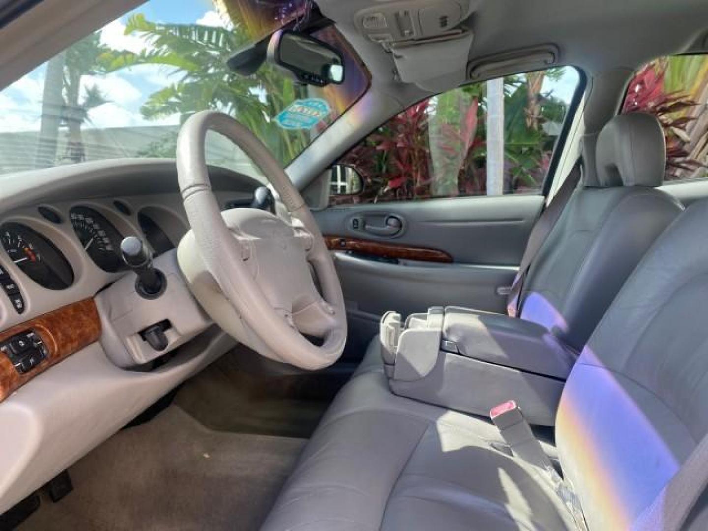 2003 Cabernet Red Metallic /Medium Gray Buick LeSabre Limited 1 OWNER FL LOW MILES 72,247 (1G4HR54KX3U) with an 3.8L 3800 V6 SFI Engine engine, Automatic transmission, located at 4701 North Dixie Hwy, Pompano Beach, FL, 33064, (954) 422-2889, 26.240938, -80.123474 - OUR WEBPAGE FLORIDACARS1.COM HAS OVER 100 PHOTOS AND FREE CARFAX LINK 2003 BUICK LESABRE LIMITED $ 31,795 NEW VIN: 1G4HR54KX3U187919 1 G 4 H R 5 4 K X 3 U 1 8 7 9 1 9 SEDAN 4 DR 3.8L V6 F 12V GASOLINE 29 MPG FRONT WHEEL DRIVE Top Features Alloy Wheels Front Seat Heaters Leather Seats Rear Seat Heate - Photo#36