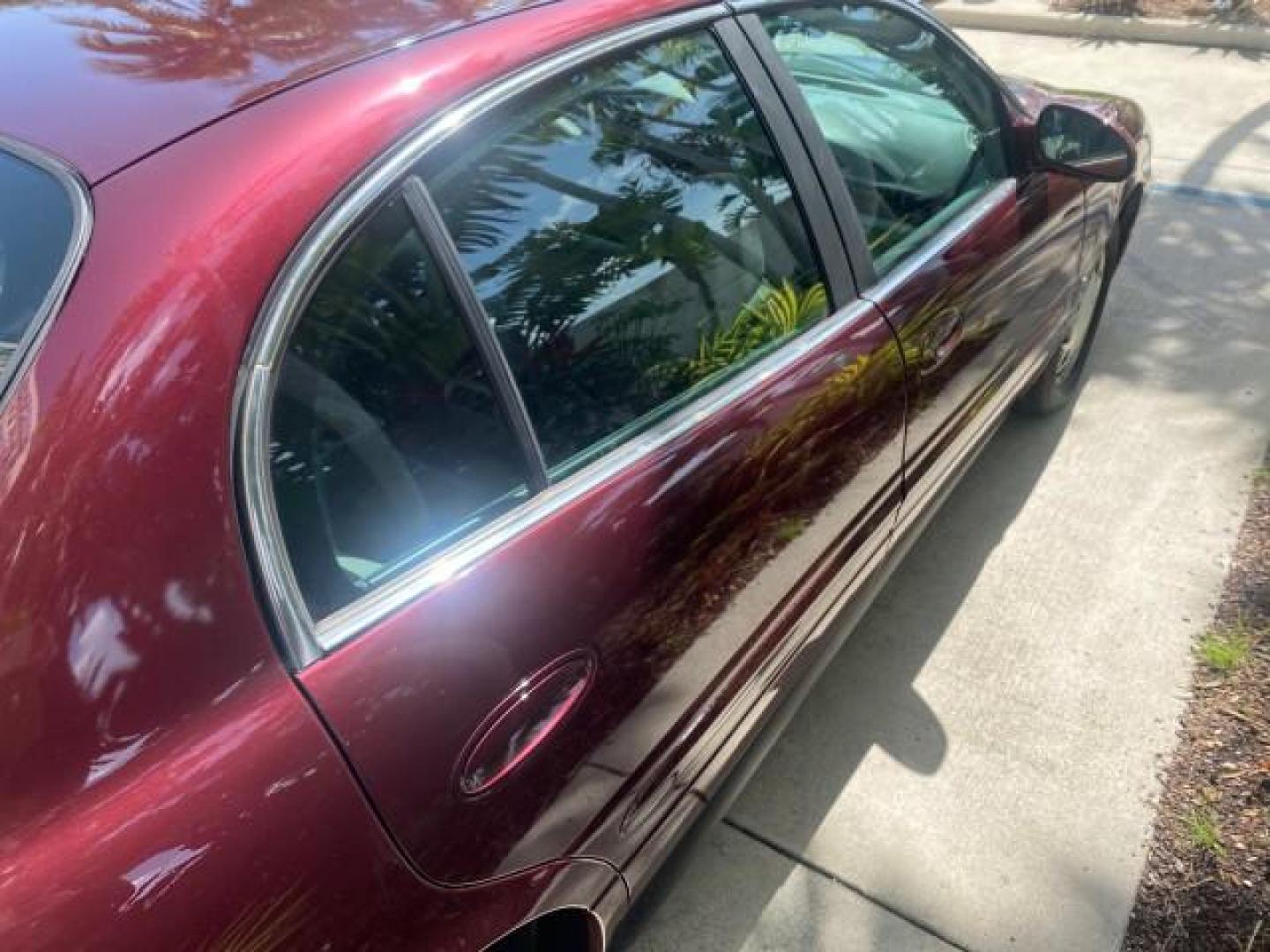 2003 Cabernet Red Metallic /Medium Gray Buick LeSabre Limited 1 OWNER FL LOW MILES 72,247 (1G4HR54KX3U) with an 3.8L 3800 V6 SFI Engine engine, Automatic transmission, located at 4701 North Dixie Hwy, Pompano Beach, FL, 33064, (954) 422-2889, 26.240938, -80.123474 - OUR WEBPAGE FLORIDACARS1.COM HAS OVER 100 PHOTOS AND FREE CARFAX LINK 2003 BUICK LESABRE LIMITED $ 31,795 NEW VIN: 1G4HR54KX3U187919 1 G 4 H R 5 4 K X 3 U 1 8 7 9 1 9 SEDAN 4 DR 3.8L V6 F 12V GASOLINE 29 MPG FRONT WHEEL DRIVE Top Features Alloy Wheels Front Seat Heaters Leather Seats Rear Seat Heate - Photo#88