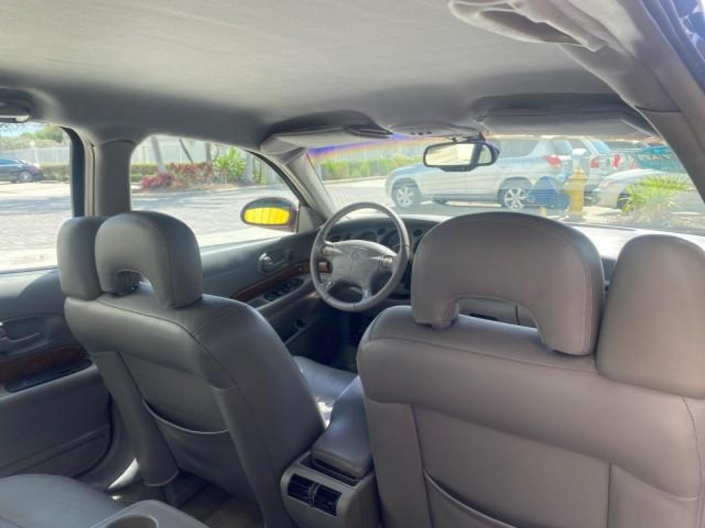 2003 Cabernet Red Metallic /Medium Gray Buick LeSabre Limited 1 OWNER FL LOW MILES 72,247 (1G4HR54KX3U) with an 3.8L 3800 V6 SFI Engine engine, Automatic transmission, located at 4701 North Dixie Hwy, Pompano Beach, FL, 33064, (954) 422-2889, 26.240938, -80.123474 - OUR WEBPAGE FLORIDACARS1.COM HAS OVER 100 PHOTOS AND FREE CARFAX LINK 2003 BUICK LESABRE LIMITED $ 31,795 NEW VIN: 1G4HR54KX3U187919 1 G 4 H R 5 4 K X 3 U 1 8 7 9 1 9 SEDAN 4 DR 3.8L V6 F 12V GASOLINE 29 MPG FRONT WHEEL DRIVE Top Features Alloy Wheels Front Seat Heaters Leather Seats Rear Seat Heate - Photo#95