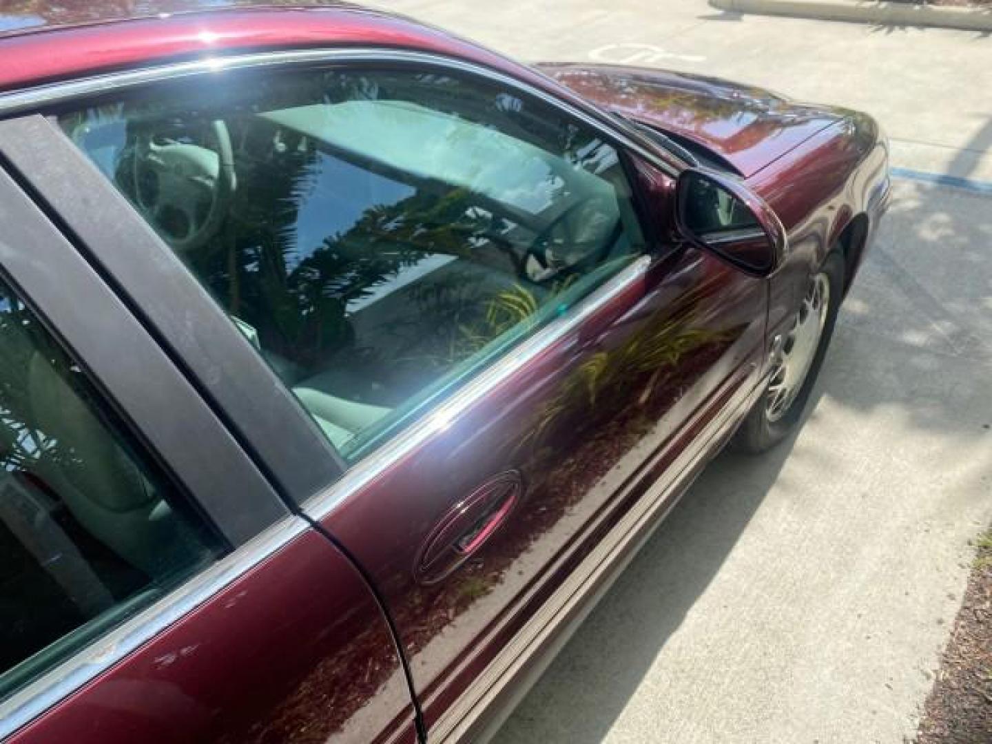 2003 Cabernet Red Metallic /Medium Gray Buick LeSabre Limited 1 OWNER FL LOW MILES 72,247 (1G4HR54KX3U) with an 3.8L 3800 V6 SFI Engine engine, Automatic transmission, located at 4701 North Dixie Hwy, Pompano Beach, FL, 33064, (954) 422-2889, 26.240938, -80.123474 - OUR WEBPAGE FLORIDACARS1.COM HAS OVER 100 PHOTOS AND FREE CARFAX LINK 2003 BUICK LESABRE LIMITED $ 31,795 NEW VIN: 1G4HR54KX3U187919 1 G 4 H R 5 4 K X 3 U 1 8 7 9 1 9 SEDAN 4 DR 3.8L V6 F 12V GASOLINE 29 MPG FRONT WHEEL DRIVE Top Features Alloy Wheels Front Seat Heaters Leather Seats Rear Seat Heate - Photo#96