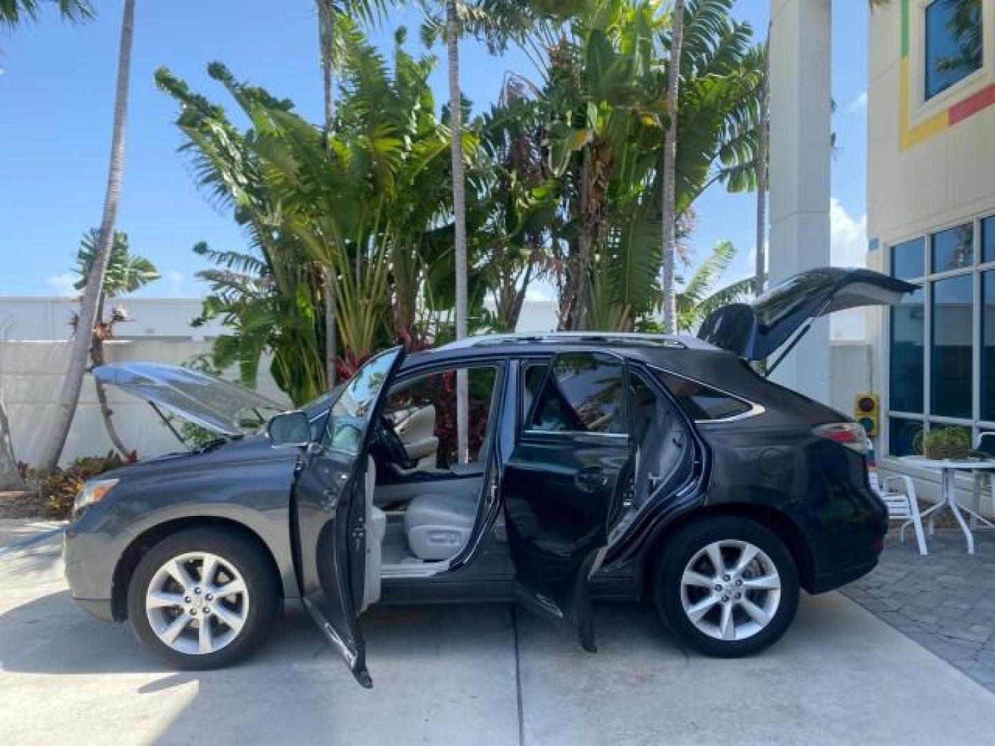 2010 Smoky Granite Mica /Light Gray Lexus RX 350 1 OWNER FL LOW MILES 86,864 (2T2ZK1BA2AC) with an 3.5L DOHC SFI 24-Valve V6 Engine engine, Automatic transmission, located at 4701 North Dixie Hwy, Pompano Beach, FL, 33064, (954) 422-2889, 26.240938, -80.123474 - OUR WEBPAGE FLORIDACARS1.COM HAS OVER 100 PHOTOS AND FREE CARFAX LINK 2010 LEXUS RX 350 VIN: 2T2ZK1BA2AC032402 2 T 2 Z K 1 B A 2 A C 0 3 2 4 0 2 4 DOOR WAGON/SPORT UTILITY 3.5L V6 F DOHC 24V GASOLINE Top Features Alloy Wheels Parking Sensors Bluetooth Technology Power Hatch/Deck Lid Front Seat Heate - Photo#8