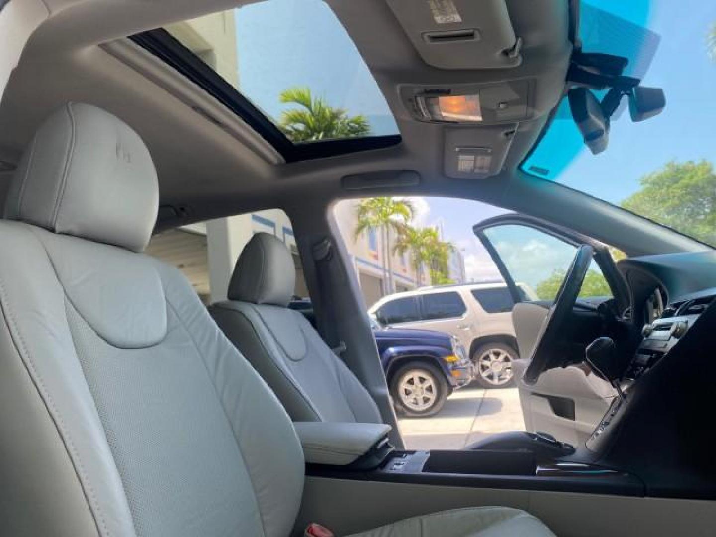 2010 Smoky Granite Mica /Light Gray Lexus RX 350 1 OWNER FL LOW MILES 86,864 (2T2ZK1BA2AC) with an 3.5L DOHC SFI 24-Valve V6 Engine engine, Automatic transmission, located at 4701 North Dixie Hwy, Pompano Beach, FL, 33064, (954) 422-2889, 26.240938, -80.123474 - OUR WEBPAGE FLORIDACARS1.COM HAS OVER 100 PHOTOS AND FREE CARFAX LINK 2010 LEXUS RX 350 VIN: 2T2ZK1BA2AC032402 2 T 2 Z K 1 B A 2 A C 0 3 2 4 0 2 4 DOOR WAGON/SPORT UTILITY 3.5L V6 F DOHC 24V GASOLINE Top Features Alloy Wheels Parking Sensors Bluetooth Technology Power Hatch/Deck Lid Front Seat Heate - Photo#12