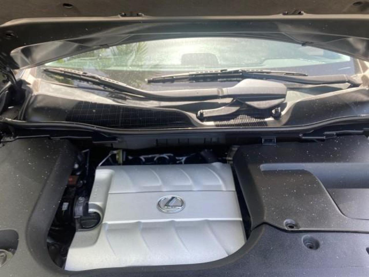 2010 Smoky Granite Mica /Light Gray Lexus RX 350 1 OWNER FL LOW MILES 86,864 (2T2ZK1BA2AC) with an 3.5L DOHC SFI 24-Valve V6 Engine engine, Automatic transmission, located at 4701 North Dixie Hwy, Pompano Beach, FL, 33064, (954) 422-2889, 26.240938, -80.123474 - OUR WEBPAGE FLORIDACARS1.COM HAS OVER 100 PHOTOS AND FREE CARFAX LINK 2010 LEXUS RX 350 VIN: 2T2ZK1BA2AC032402 2 T 2 Z K 1 B A 2 A C 0 3 2 4 0 2 4 DOOR WAGON/SPORT UTILITY 3.5L V6 F DOHC 24V GASOLINE Top Features Alloy Wheels Parking Sensors Bluetooth Technology Power Hatch/Deck Lid Front Seat Heate - Photo#17