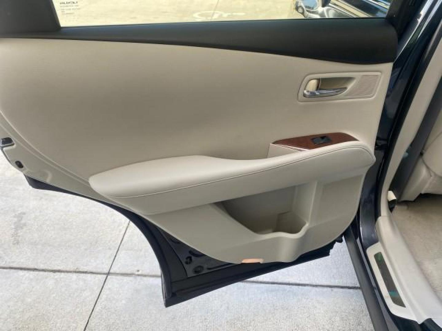 2010 Smoky Granite Mica /Light Gray Lexus RX 350 1 OWNER FL LOW MILES 86,864 (2T2ZK1BA2AC) with an 3.5L DOHC SFI 24-Valve V6 Engine engine, Automatic transmission, located at 4701 North Dixie Hwy, Pompano Beach, FL, 33064, (954) 422-2889, 26.240938, -80.123474 - OUR WEBPAGE FLORIDACARS1.COM HAS OVER 100 PHOTOS AND FREE CARFAX LINK 2010 LEXUS RX 350 VIN: 2T2ZK1BA2AC032402 2 T 2 Z K 1 B A 2 A C 0 3 2 4 0 2 4 DOOR WAGON/SPORT UTILITY 3.5L V6 F DOHC 24V GASOLINE Top Features Alloy Wheels Parking Sensors Bluetooth Technology Power Hatch/Deck Lid Front Seat Heate - Photo#70