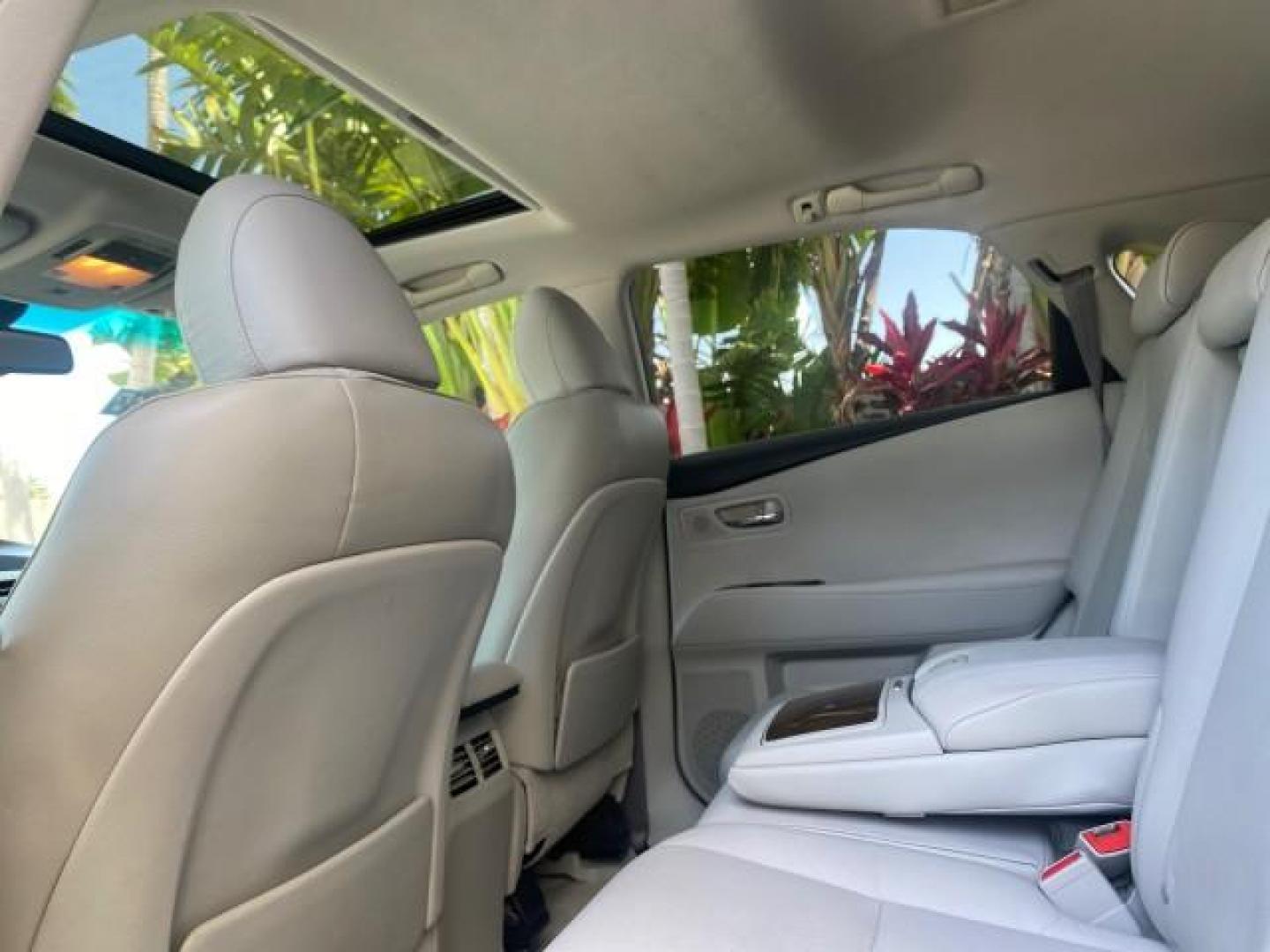 2010 Smoky Granite Mica /Light Gray Lexus RX 350 1 OWNER FL LOW MILES 86,864 (2T2ZK1BA2AC) with an 3.5L DOHC SFI 24-Valve V6 Engine engine, Automatic transmission, located at 4701 North Dixie Hwy, Pompano Beach, FL, 33064, (954) 422-2889, 26.240938, -80.123474 - OUR WEBPAGE FLORIDACARS1.COM HAS OVER 100 PHOTOS AND FREE CARFAX LINK 2010 LEXUS RX 350 VIN: 2T2ZK1BA2AC032402 2 T 2 Z K 1 B A 2 A C 0 3 2 4 0 2 4 DOOR WAGON/SPORT UTILITY 3.5L V6 F DOHC 24V GASOLINE Top Features Alloy Wheels Parking Sensors Bluetooth Technology Power Hatch/Deck Lid Front Seat Heate - Photo#73