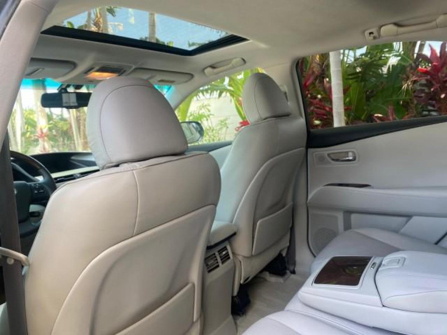 2010 Smoky Granite Mica /Light Gray Lexus RX 350 1 OWNER FL LOW MILES 86,864 (2T2ZK1BA2AC) with an 3.5L DOHC SFI 24-Valve V6 Engine engine, Automatic transmission, located at 4701 North Dixie Hwy, Pompano Beach, FL, 33064, (954) 422-2889, 26.240938, -80.123474 - OUR WEBPAGE FLORIDACARS1.COM HAS OVER 100 PHOTOS AND FREE CARFAX LINK 2010 LEXUS RX 350 VIN: 2T2ZK1BA2AC032402 2 T 2 Z K 1 B A 2 A C 0 3 2 4 0 2 4 DOOR WAGON/SPORT UTILITY 3.5L V6 F DOHC 24V GASOLINE Top Features Alloy Wheels Parking Sensors Bluetooth Technology Power Hatch/Deck Lid Front Seat Heate - Photo#74