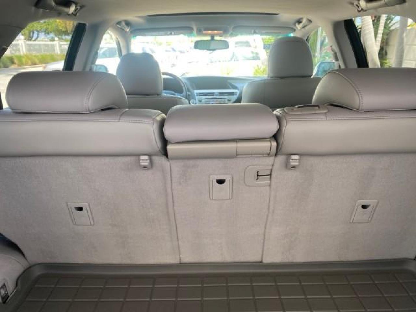 2010 Smoky Granite Mica /Light Gray Lexus RX 350 1 OWNER FL LOW MILES 86,864 (2T2ZK1BA2AC) with an 3.5L DOHC SFI 24-Valve V6 Engine engine, Automatic transmission, located at 4701 North Dixie Hwy, Pompano Beach, FL, 33064, (954) 422-2889, 26.240938, -80.123474 - OUR WEBPAGE FLORIDACARS1.COM HAS OVER 100 PHOTOS AND FREE CARFAX LINK 2010 LEXUS RX 350 VIN: 2T2ZK1BA2AC032402 2 T 2 Z K 1 B A 2 A C 0 3 2 4 0 2 4 DOOR WAGON/SPORT UTILITY 3.5L V6 F DOHC 24V GASOLINE Top Features Alloy Wheels Parking Sensors Bluetooth Technology Power Hatch/Deck Lid Front Seat Heate - Photo#92