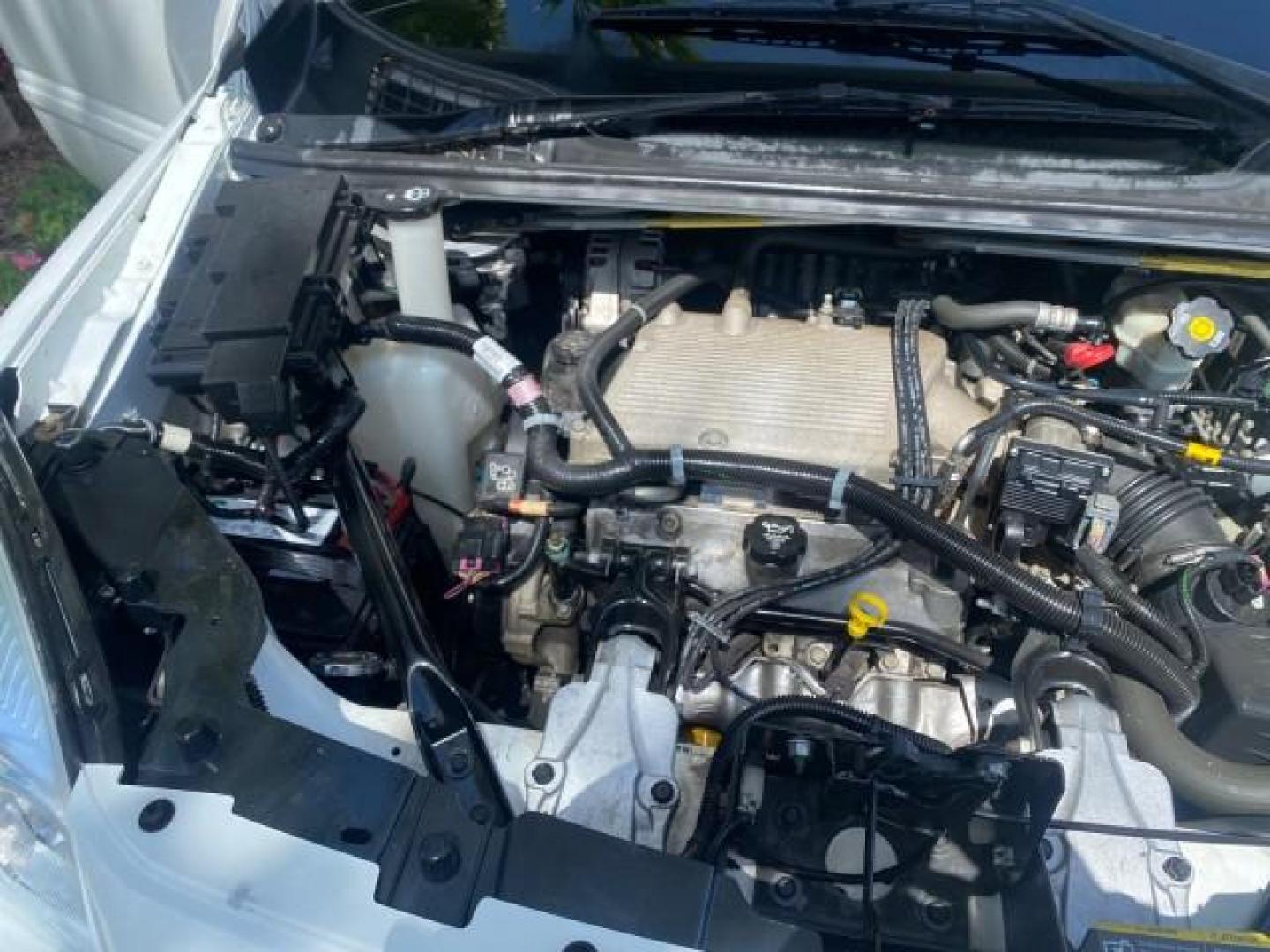 2005 Summit White /Neutral Chevrolet Uplander 1 OWNER LS LOW MILES 30,731 (1GNDV23L85D) with an 3.5L 3500 V6 SFI Engine engine, Automatic transmission, located at 4701 North Dixie Hwy, Pompano Beach, FL, 33064, (954) 422-2889, 26.240938, -80.123474 - OUR WEBPAGE FLORIDACARS1.COM HAS OVER 100 PHOTOS AND FREE CARFAX LINK 2005 CHEVROLET UPLANDER LS VIN: 1GNDV23L85D243888 1 G N D V 2 3 L 8 5 D 2 4 3 8 8 8 VAN 3.5L I6 F GASOLINE FRONT WHEEL DRIVE Top Features Alloy Wheels Leatherette and Cloth Parking Sensors Quad Seats Rear Air Conditioning Rear E - Photo#25