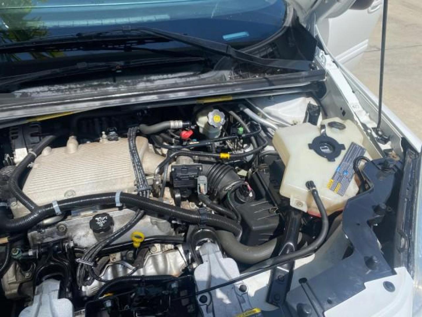 2005 Summit White /Neutral Chevrolet Uplander 1 OWNER LS LOW MILES 30,731 (1GNDV23L85D) with an 3.5L 3500 V6 SFI Engine engine, Automatic transmission, located at 4701 North Dixie Hwy, Pompano Beach, FL, 33064, (954) 422-2889, 26.240938, -80.123474 - OUR WEBPAGE FLORIDACARS1.COM HAS OVER 100 PHOTOS AND FREE CARFAX LINK 2005 CHEVROLET UPLANDER LS VIN: 1GNDV23L85D243888 1 G N D V 2 3 L 8 5 D 2 4 3 8 8 8 VAN 3.5L I6 F GASOLINE FRONT WHEEL DRIVE Top Features Alloy Wheels Leatherette and Cloth Parking Sensors Quad Seats Rear Air Conditioning Rear E - Photo#26