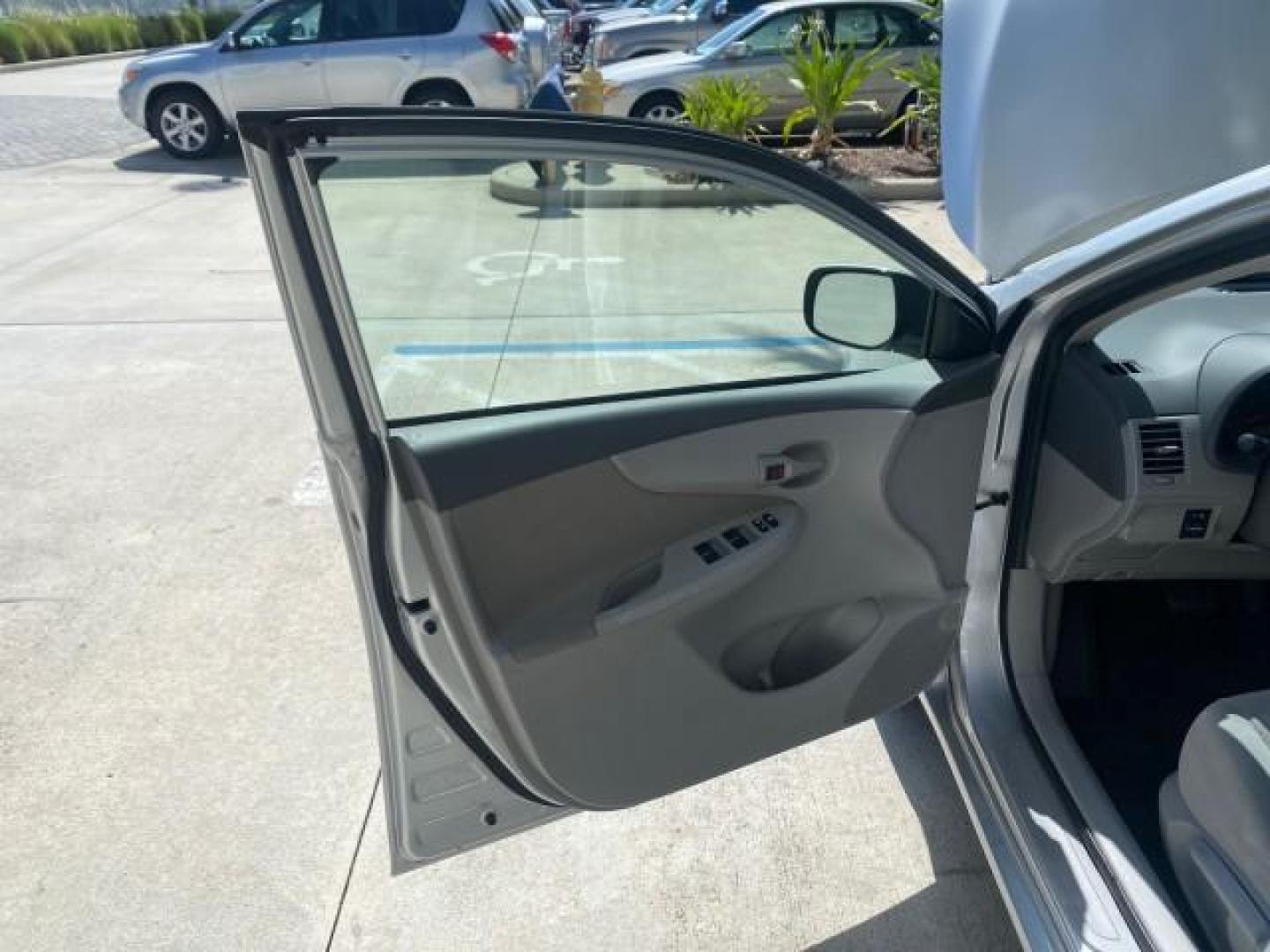 2009 Super White /Ash Toyota Corolla LE 1 OWNER LOW MILES 27,181 (JTDBL40E79J) with an 1.8L DOHC SFI 16-Valve VVT-i 4-Cyl Engine engine, Automatic transmission, located at 4701 North Dixie Hwy, Pompano Beach, FL, 33064, (954) 422-2889, 26.240938, -80.123474 - OUR WEBPAGE FLORIDACARS1.COM HAS OVER 100 PHOTOS AND FREE CARFAX LINK 2009 TOYOTA COROLLA LE VIN: JTDBL40E79J022099 J T D B L 4 0 E 7 9 J 0 2 2 0 9 9 SEDAN 4 DR 1.8L I4 F DOHC 16V 35 MPG GASOLINE FRONT WHEEL DRIVE Top Features Cloth Seats Basic Features ABS Brakes AM/FM Stereo Air Conditioning Autom - Photo#9