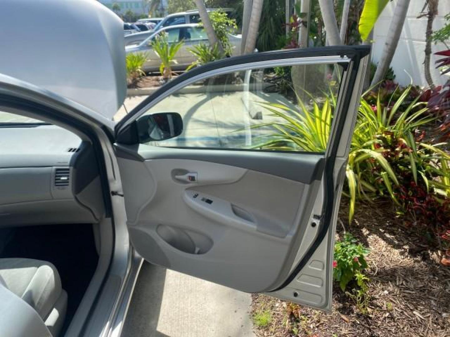 2009 Super White /Ash Toyota Corolla LE 1 OWNER LOW MILES 27,181 (JTDBL40E79J) with an 1.8L DOHC SFI 16-Valve VVT-i 4-Cyl Engine engine, Automatic transmission, located at 4701 North Dixie Hwy, Pompano Beach, FL, 33064, (954) 422-2889, 26.240938, -80.123474 - OUR WEBPAGE FLORIDACARS1.COM HAS OVER 100 PHOTOS AND FREE CARFAX LINK 2009 TOYOTA COROLLA LE VIN: JTDBL40E79J022099 J T D B L 4 0 E 7 9 J 0 2 2 0 9 9 SEDAN 4 DR 1.8L I4 F DOHC 16V 35 MPG GASOLINE FRONT WHEEL DRIVE Top Features Cloth Seats Basic Features ABS Brakes AM/FM Stereo Air Conditioning Autom - Photo#11