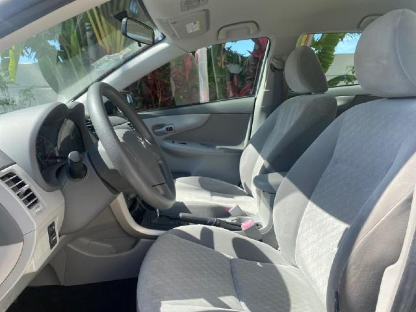 2009 Super White /Ash Toyota Corolla LE 1 OWNER LOW MILES 27,181 (JTDBL40E79J) with an 1.8L DOHC SFI 16-Valve VVT-i 4-Cyl Engine engine, Automatic transmission, located at 4701 North Dixie Hwy, Pompano Beach, FL, 33064, (954) 422-2889, 26.240938, -80.123474 - OUR WEBPAGE FLORIDACARS1.COM HAS OVER 100 PHOTOS AND FREE CARFAX LINK 2009 TOYOTA COROLLA LE VIN: JTDBL40E79J022099 J T D B L 4 0 E 7 9 J 0 2 2 0 9 9 SEDAN 4 DR 1.8L I4 F DOHC 16V 35 MPG GASOLINE FRONT WHEEL DRIVE Top Features Cloth Seats Basic Features ABS Brakes AM/FM Stereo Air Conditioning Autom - Photo#32