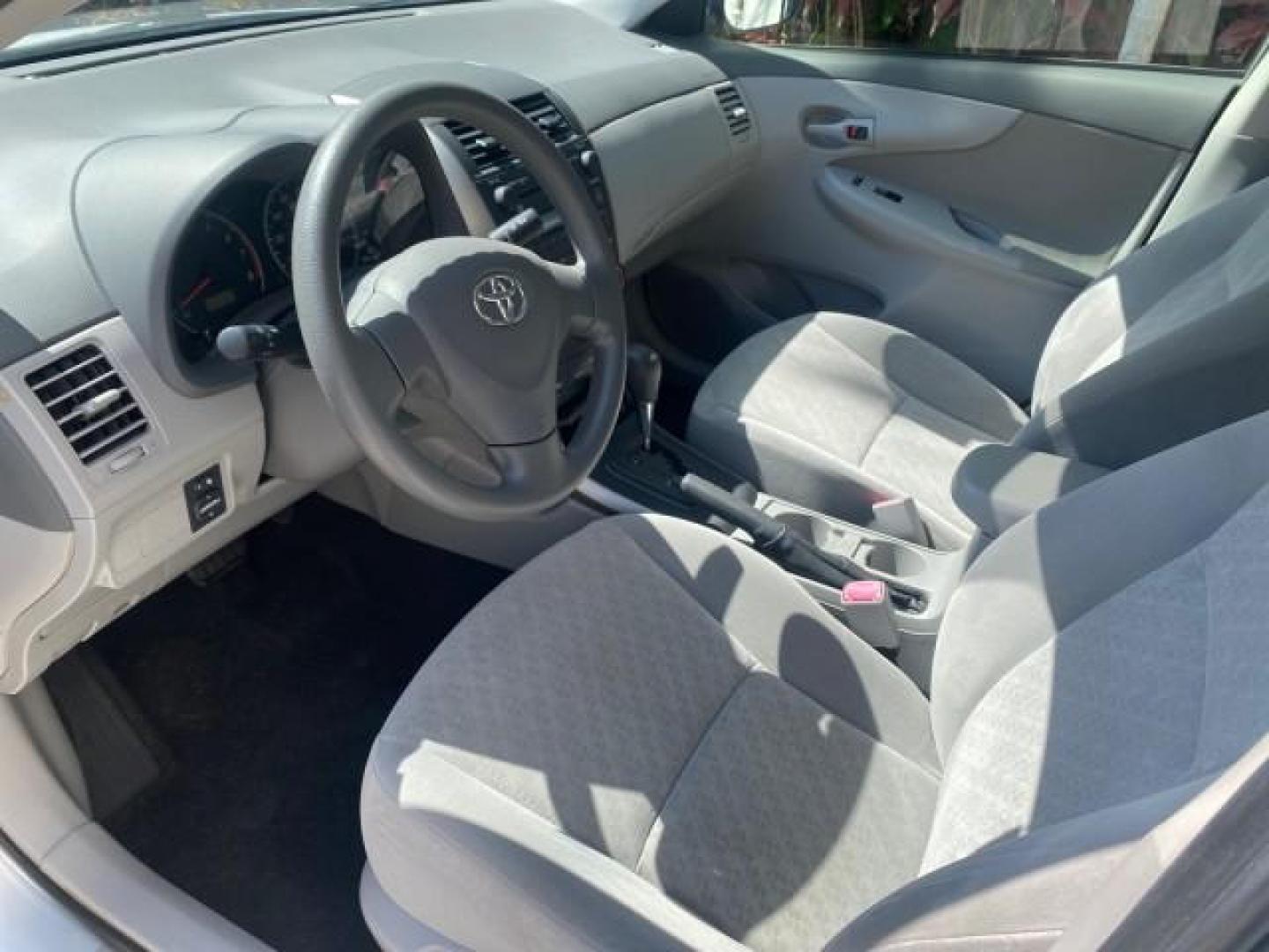 2009 Super White /Ash Toyota Corolla LE 1 OWNER LOW MILES 27,181 (JTDBL40E79J) with an 1.8L DOHC SFI 16-Valve VVT-i 4-Cyl Engine engine, Automatic transmission, located at 4701 North Dixie Hwy, Pompano Beach, FL, 33064, (954) 422-2889, 26.240938, -80.123474 - OUR WEBPAGE FLORIDACARS1.COM HAS OVER 100 PHOTOS AND FREE CARFAX LINK 2009 TOYOTA COROLLA LE VIN: JTDBL40E79J022099 J T D B L 4 0 E 7 9 J 0 2 2 0 9 9 SEDAN 4 DR 1.8L I4 F DOHC 16V 35 MPG GASOLINE FRONT WHEEL DRIVE Top Features Cloth Seats Basic Features ABS Brakes AM/FM Stereo Air Conditioning Autom - Photo#34