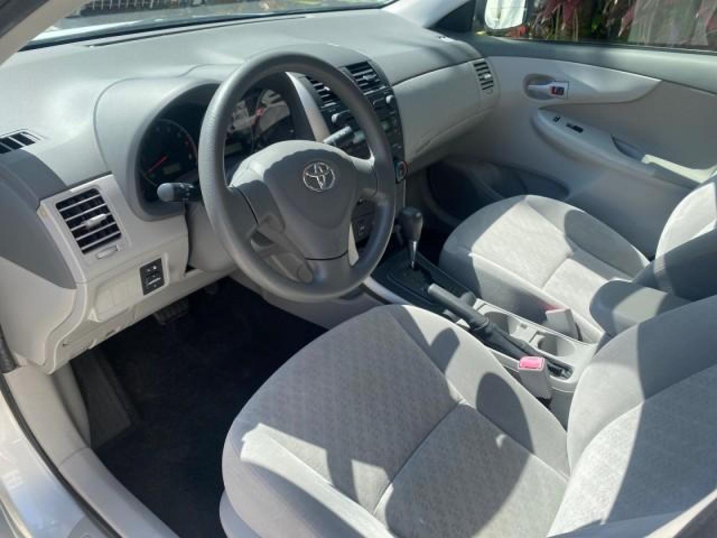 2009 Super White /Ash Toyota Corolla LE 1 OWNER LOW MILES 27,181 (JTDBL40E79J) with an 1.8L DOHC SFI 16-Valve VVT-i 4-Cyl Engine engine, Automatic transmission, located at 4701 North Dixie Hwy, Pompano Beach, FL, 33064, (954) 422-2889, 26.240938, -80.123474 - OUR WEBPAGE FLORIDACARS1.COM HAS OVER 100 PHOTOS AND FREE CARFAX LINK 2009 TOYOTA COROLLA LE VIN: JTDBL40E79J022099 J T D B L 4 0 E 7 9 J 0 2 2 0 9 9 SEDAN 4 DR 1.8L I4 F DOHC 16V 35 MPG GASOLINE FRONT WHEEL DRIVE Top Features Cloth Seats Basic Features ABS Brakes AM/FM Stereo Air Conditioning Autom - Photo#35