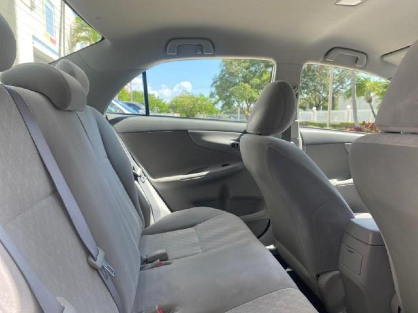 2009 Super White /Ash Toyota Corolla LE 1 OWNER LOW MILES 27,181 (JTDBL40E79J) with an 1.8L DOHC SFI 16-Valve VVT-i 4-Cyl Engine engine, Automatic transmission, located at 4701 North Dixie Hwy, Pompano Beach, FL, 33064, (954) 422-2889, 26.240938, -80.123474 - OUR WEBPAGE FLORIDACARS1.COM HAS OVER 100 PHOTOS AND FREE CARFAX LINK 2009 TOYOTA COROLLA LE VIN: JTDBL40E79J022099 J T D B L 4 0 E 7 9 J 0 2 2 0 9 9 SEDAN 4 DR 1.8L I4 F DOHC 16V 35 MPG GASOLINE FRONT WHEEL DRIVE Top Features Cloth Seats Basic Features ABS Brakes AM/FM Stereo Air Conditioning Autom - Photo#88