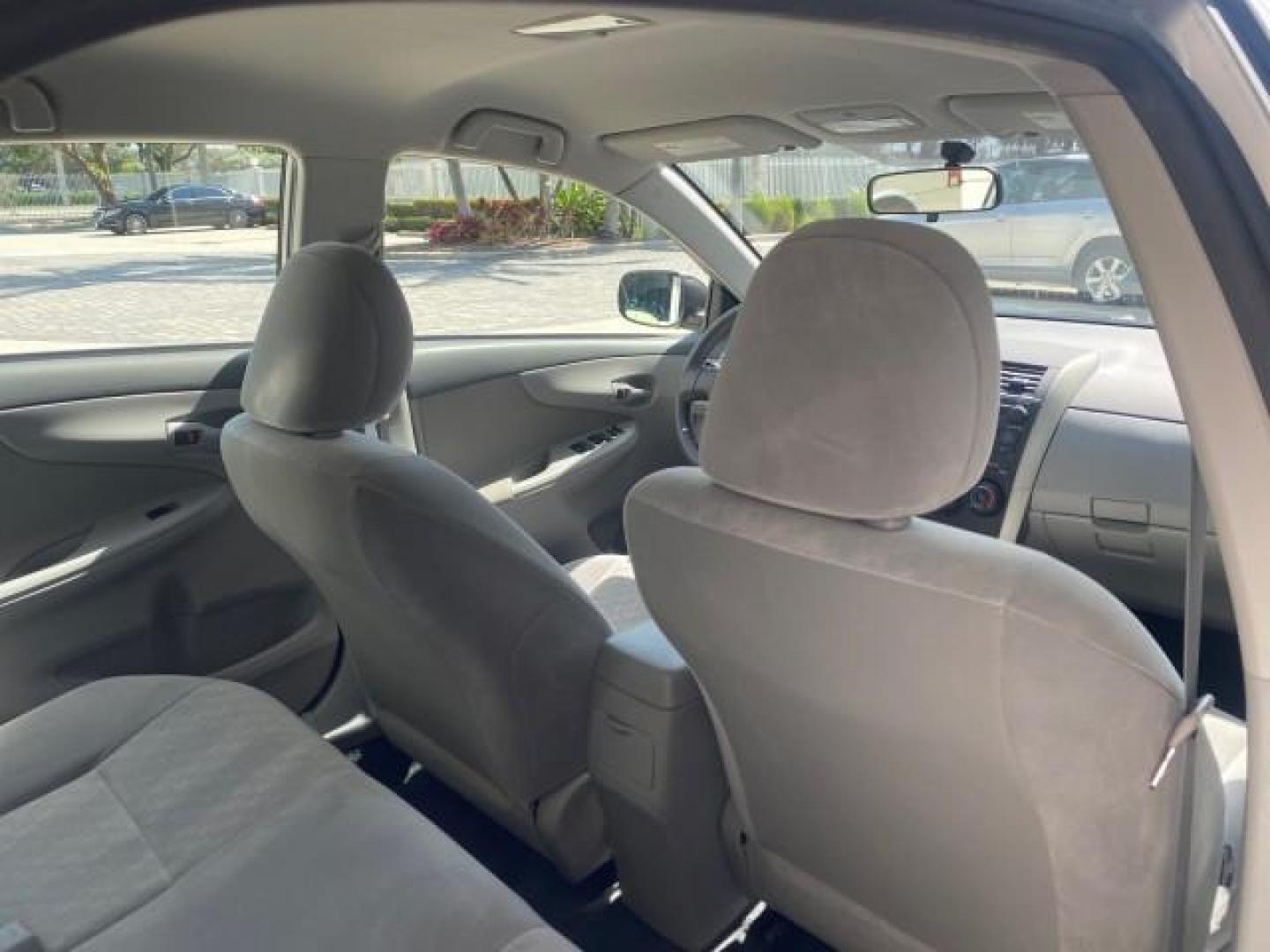 2009 Super White /Ash Toyota Corolla LE 1 OWNER LOW MILES 27,181 (JTDBL40E79J) with an 1.8L DOHC SFI 16-Valve VVT-i 4-Cyl Engine engine, Automatic transmission, located at 4701 North Dixie Hwy, Pompano Beach, FL, 33064, (954) 422-2889, 26.240938, -80.123474 - OUR WEBPAGE FLORIDACARS1.COM HAS OVER 100 PHOTOS AND FREE CARFAX LINK 2009 TOYOTA COROLLA LE VIN: JTDBL40E79J022099 J T D B L 4 0 E 7 9 J 0 2 2 0 9 9 SEDAN 4 DR 1.8L I4 F DOHC 16V 35 MPG GASOLINE FRONT WHEEL DRIVE Top Features Cloth Seats Basic Features ABS Brakes AM/FM Stereo Air Conditioning Autom - Photo#89