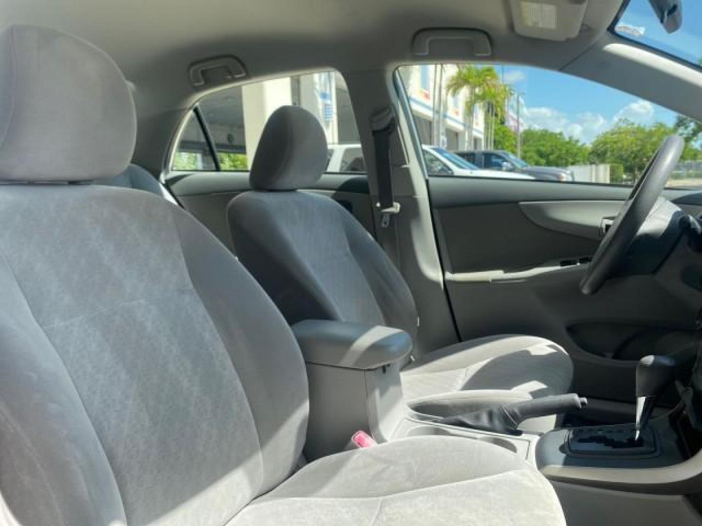 2009 Super White /Ash Toyota Corolla LE 1 OWNER LOW MILES 27,181 (JTDBL40E79J) with an 1.8L DOHC SFI 16-Valve VVT-i 4-Cyl Engine engine, Automatic transmission, located at 4701 North Dixie Hwy, Pompano Beach, FL, 33064, (954) 422-2889, 26.240938, -80.123474 - OUR WEBPAGE FLORIDACARS1.COM HAS OVER 100 PHOTOS AND FREE CARFAX LINK 2009 TOYOTA COROLLA LE VIN: JTDBL40E79J022099 J T D B L 4 0 E 7 9 J 0 2 2 0 9 9 SEDAN 4 DR 1.8L I4 F DOHC 16V 35 MPG GASOLINE FRONT WHEEL DRIVE Top Features Cloth Seats Basic Features ABS Brakes AM/FM Stereo Air Conditioning Autom - Photo#94