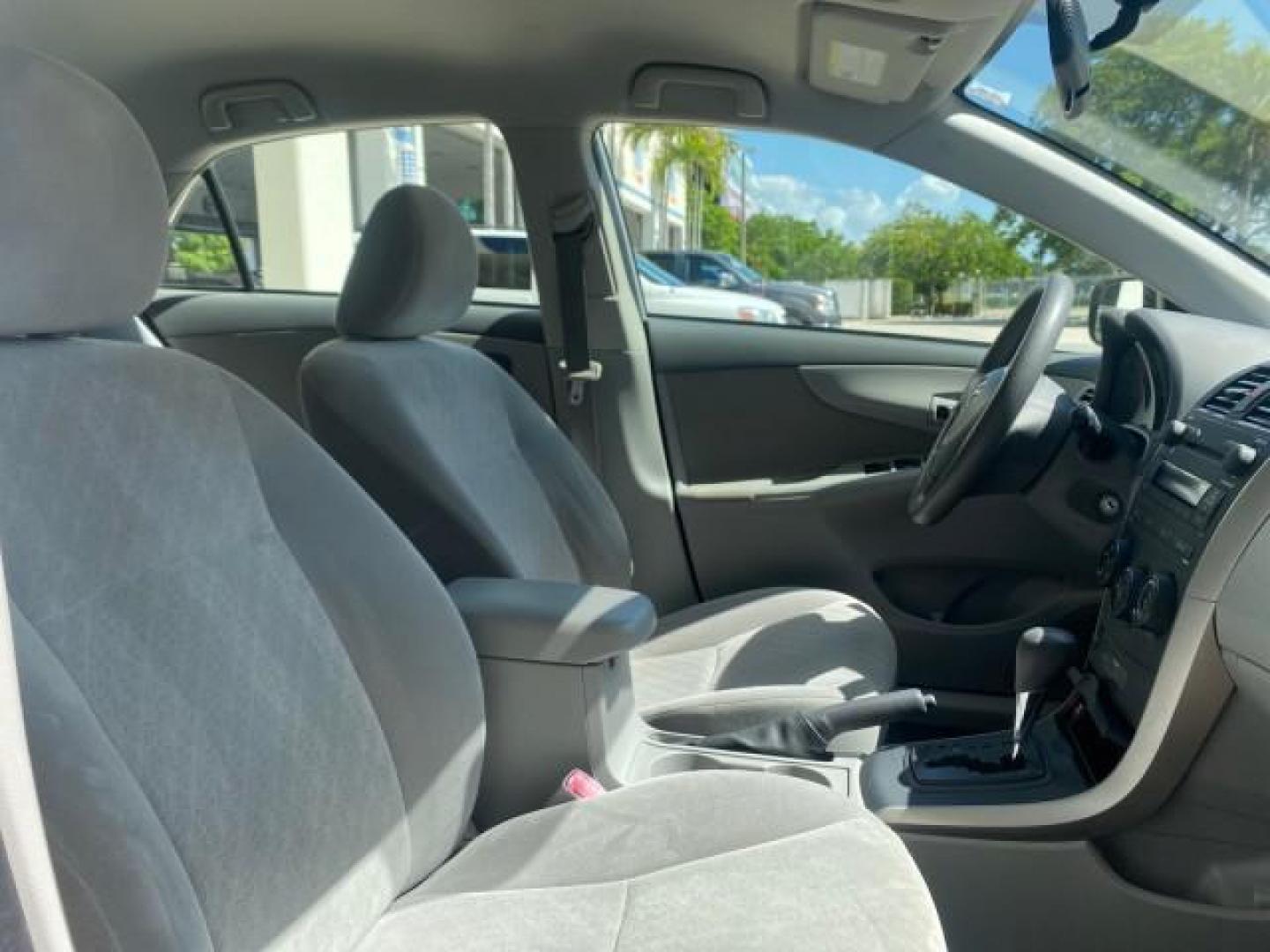 2009 Super White /Ash Toyota Corolla LE 1 OWNER LOW MILES 27,181 (JTDBL40E79J) with an 1.8L DOHC SFI 16-Valve VVT-i 4-Cyl Engine engine, Automatic transmission, located at 4701 North Dixie Hwy, Pompano Beach, FL, 33064, (954) 422-2889, 26.240938, -80.123474 - OUR WEBPAGE FLORIDACARS1.COM HAS OVER 100 PHOTOS AND FREE CARFAX LINK 2009 TOYOTA COROLLA LE VIN: JTDBL40E79J022099 J T D B L 4 0 E 7 9 J 0 2 2 0 9 9 SEDAN 4 DR 1.8L I4 F DOHC 16V 35 MPG GASOLINE FRONT WHEEL DRIVE Top Features Cloth Seats Basic Features ABS Brakes AM/FM Stereo Air Conditioning Autom - Photo#95