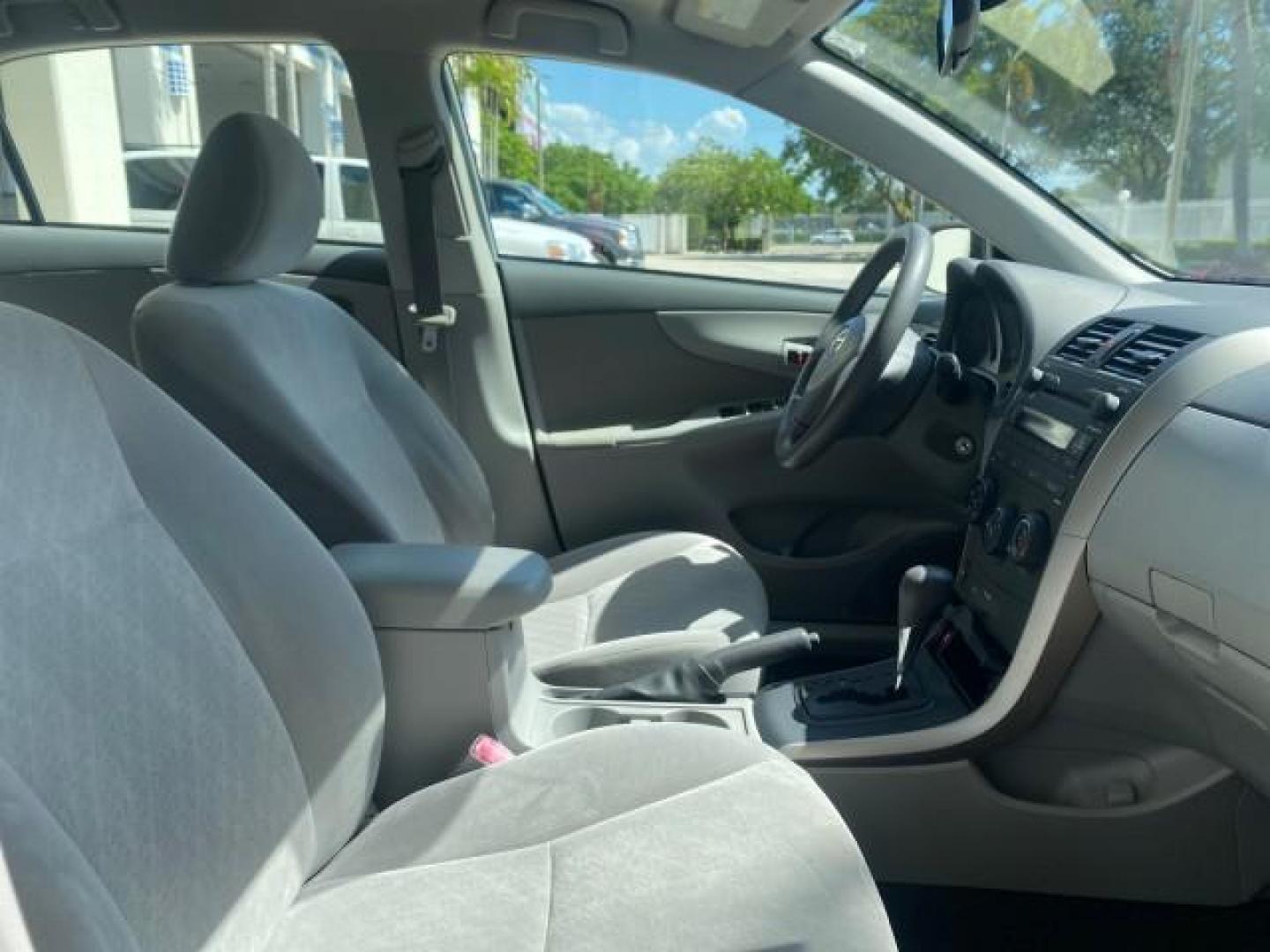 2009 Super White /Ash Toyota Corolla LE 1 OWNER LOW MILES 27,181 (JTDBL40E79J) with an 1.8L DOHC SFI 16-Valve VVT-i 4-Cyl Engine engine, Automatic transmission, located at 4701 North Dixie Hwy, Pompano Beach, FL, 33064, (954) 422-2889, 26.240938, -80.123474 - OUR WEBPAGE FLORIDACARS1.COM HAS OVER 100 PHOTOS AND FREE CARFAX LINK 2009 TOYOTA COROLLA LE VIN: JTDBL40E79J022099 J T D B L 4 0 E 7 9 J 0 2 2 0 9 9 SEDAN 4 DR 1.8L I4 F DOHC 16V 35 MPG GASOLINE FRONT WHEEL DRIVE Top Features Cloth Seats Basic Features ABS Brakes AM/FM Stereo Air Conditioning Autom - Photo#96