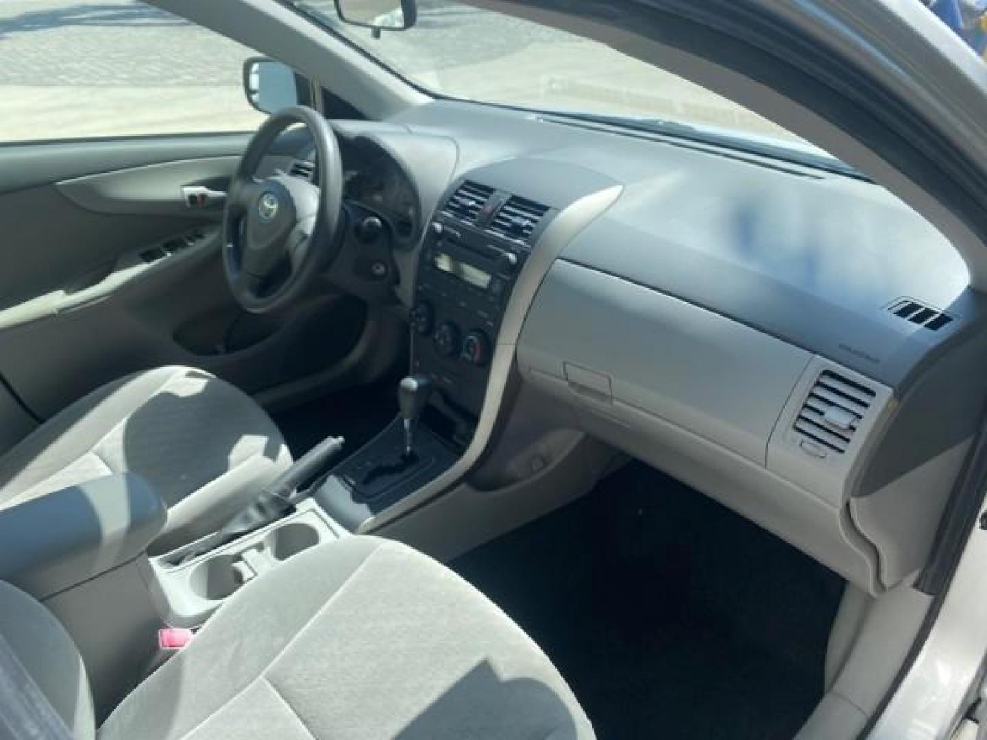 2009 Super White /Ash Toyota Corolla LE 1 OWNER LOW MILES 27,181 (JTDBL40E79J) with an 1.8L DOHC SFI 16-Valve VVT-i 4-Cyl Engine engine, Automatic transmission, located at 4701 North Dixie Hwy, Pompano Beach, FL, 33064, (954) 422-2889, 26.240938, -80.123474 - OUR WEBPAGE FLORIDACARS1.COM HAS OVER 100 PHOTOS AND FREE CARFAX LINK 2009 TOYOTA COROLLA LE VIN: JTDBL40E79J022099 J T D B L 4 0 E 7 9 J 0 2 2 0 9 9 SEDAN 4 DR 1.8L I4 F DOHC 16V 35 MPG GASOLINE FRONT WHEEL DRIVE Top Features Cloth Seats Basic Features ABS Brakes AM/FM Stereo Air Conditioning Autom - Photo#98