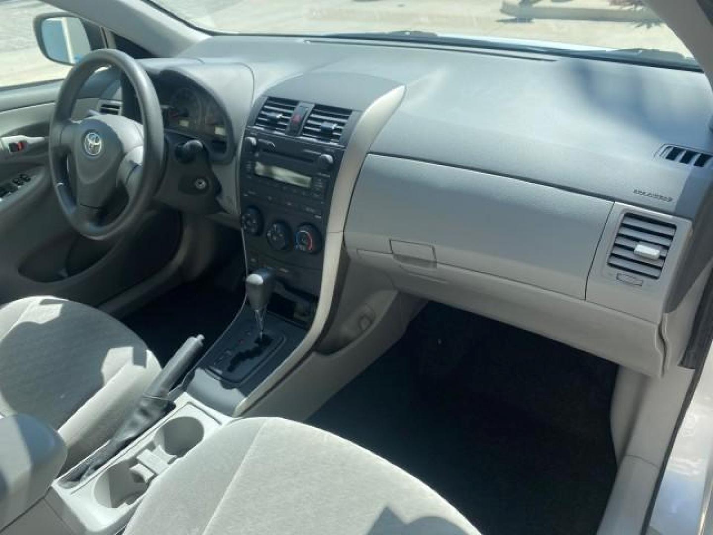 2009 Super White /Ash Toyota Corolla LE 1 OWNER LOW MILES 27,181 (JTDBL40E79J) with an 1.8L DOHC SFI 16-Valve VVT-i 4-Cyl Engine engine, Automatic transmission, located at 4701 North Dixie Hwy, Pompano Beach, FL, 33064, (954) 422-2889, 26.240938, -80.123474 - OUR WEBPAGE FLORIDACARS1.COM HAS OVER 100 PHOTOS AND FREE CARFAX LINK 2009 TOYOTA COROLLA LE VIN: JTDBL40E79J022099 J T D B L 4 0 E 7 9 J 0 2 2 0 9 9 SEDAN 4 DR 1.8L I4 F DOHC 16V 35 MPG GASOLINE FRONT WHEEL DRIVE Top Features Cloth Seats Basic Features ABS Brakes AM/FM Stereo Air Conditioning Autom - Photo#99
