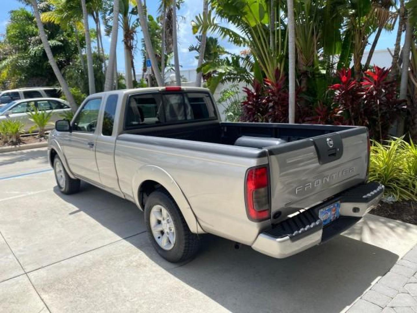 2004 Radiant Silver Metallic /Gray Nissan Frontier 2WD XE LOW MILES 70,508 (1N6DD26T74C) with an 2.4L DOHC SMPI 16-Valve 4-Cyl Engine engine, Manual transmission, located at 4701 North Dixie Hwy, Pompano Beach, FL, 33064, (954) 422-2889, 26.240938, -80.123474 - OUR WEBPAGE FLORIDACARS1.COM HAS OVER 100 PHOTOS AND FREE CARFAX LINK 2004 NISSAN FRONTIER VIN: 1N6DD26T74C451236 CLUB CAB PICKUP 2.4L I4 F DOHC 16V GASOLINE REAR WHEEL DRIVE Top Features Bed Liner Cloth Seats Basic Features ABS Brakes AM/FM Stereo Air Conditioning CD Audio Manual Transmission Power - Photo#5