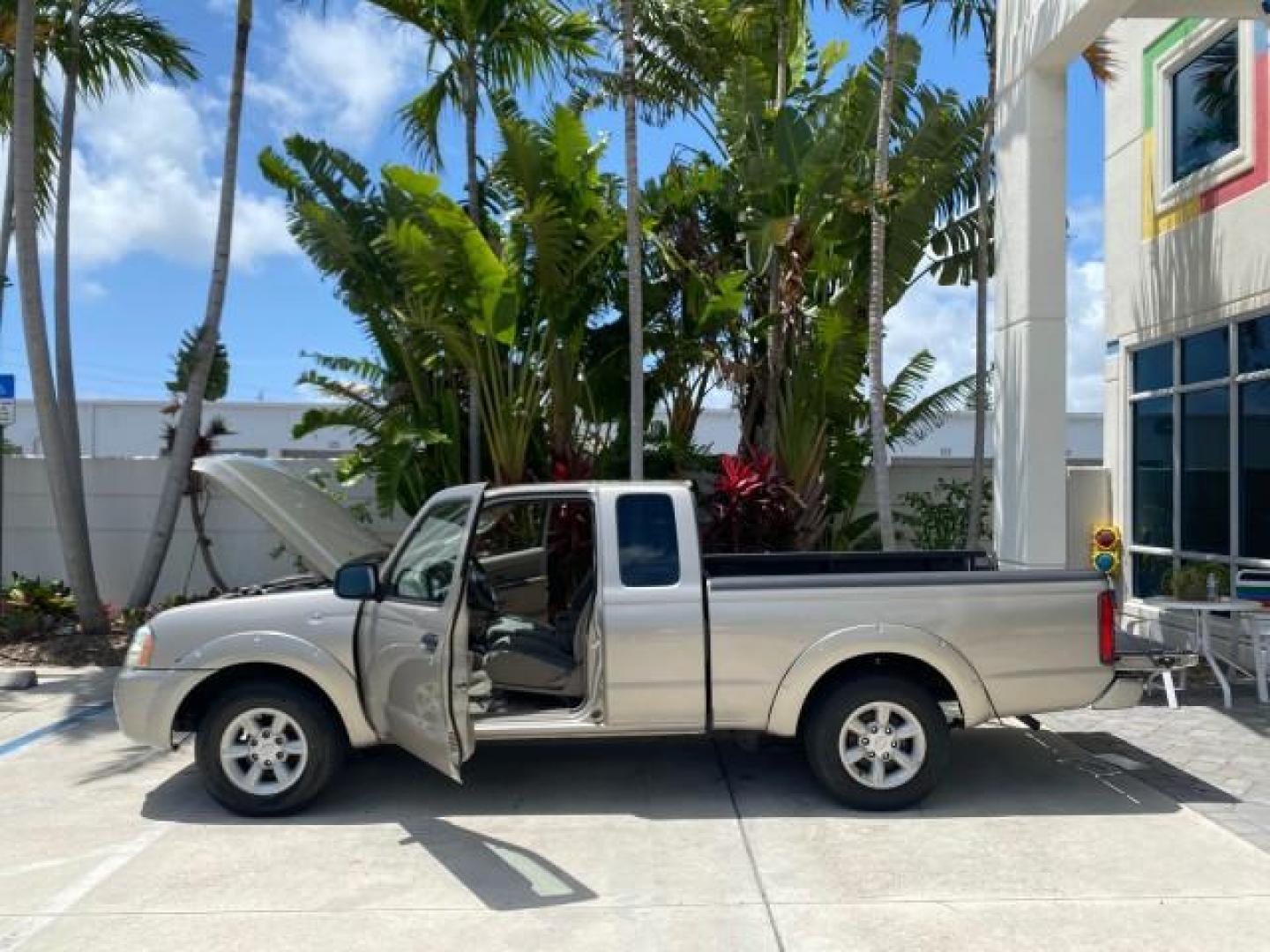 2004 Radiant Silver Metallic /Gray Nissan Frontier 2WD XE LOW MILES 70,508 (1N6DD26T74C) with an 2.4L DOHC SMPI 16-Valve 4-Cyl Engine engine, Manual transmission, located at 4701 North Dixie Hwy, Pompano Beach, FL, 33064, (954) 422-2889, 26.240938, -80.123474 - OUR WEBPAGE FLORIDACARS1.COM HAS OVER 100 PHOTOS AND FREE CARFAX LINK 2004 NISSAN FRONTIER VIN: 1N6DD26T74C451236 CLUB CAB PICKUP 2.4L I4 F DOHC 16V GASOLINE REAR WHEEL DRIVE Top Features Bed Liner Cloth Seats Basic Features ABS Brakes AM/FM Stereo Air Conditioning CD Audio Manual Transmission Power - Photo#8