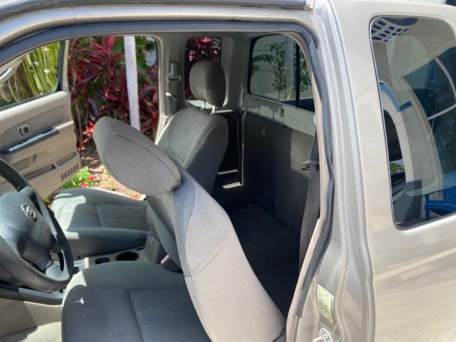 2004 Radiant Silver Metallic /Gray Nissan Frontier 2WD XE LOW MILES 70,694 (1N6DD26T74C) with an 2.4L DOHC SMPI 16-Valve 4-Cyl Engine engine, Manual transmission, located at 4701 North Dixie Hwy, Pompano Beach, FL, 33064, (954) 422-2889, 26.240938, -80.123474 - OUR WEBPAGE FLORIDACARS1.COM HAS OVER 100 PHOTOS AND FREE CARFAX LINK 2004 NISSAN FRONTIER VIN: 1N6DD26T74C451236 CLUB CAB PICKUP 2.4L I4 F DOHC 16V GASOLINE REAR WHEEL DRIVE Top Features Bed Liner Cloth Seats Basic Features ABS Brakes AM/FM Stereo Air Conditioning CD Audio Manual Transmission Power - Photo#13