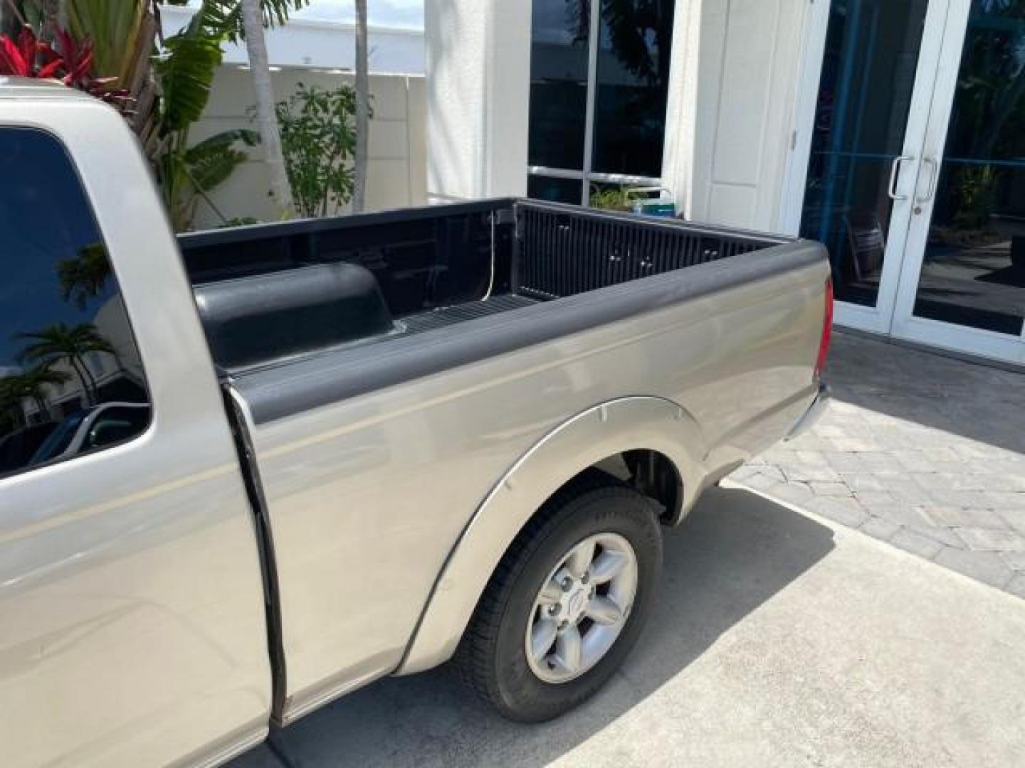 2004 Radiant Silver Metallic /Gray Nissan Frontier 2WD XE LOW MILES 70,508 (1N6DD26T74C) with an 2.4L DOHC SMPI 16-Valve 4-Cyl Engine engine, Manual transmission, located at 4701 North Dixie Hwy, Pompano Beach, FL, 33064, (954) 422-2889, 26.240938, -80.123474 - OUR WEBPAGE FLORIDACARS1.COM HAS OVER 100 PHOTOS AND FREE CARFAX LINK 2004 NISSAN FRONTIER VIN: 1N6DD26T74C451236 CLUB CAB PICKUP 2.4L I4 F DOHC 16V GASOLINE REAR WHEEL DRIVE Top Features Bed Liner Cloth Seats Basic Features ABS Brakes AM/FM Stereo Air Conditioning CD Audio Manual Transmission Power - Photo#14