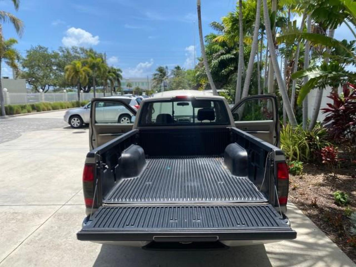 2004 Radiant Silver Metallic /Gray Nissan Frontier 2WD XE LOW MILES 70,508 (1N6DD26T74C) with an 2.4L DOHC SMPI 16-Valve 4-Cyl Engine engine, Manual transmission, located at 4701 North Dixie Hwy, Pompano Beach, FL, 33064, (954) 422-2889, 26.240938, -80.123474 - OUR WEBPAGE FLORIDACARS1.COM HAS OVER 100 PHOTOS AND FREE CARFAX LINK 2004 NISSAN FRONTIER VIN: 1N6DD26T74C451236 CLUB CAB PICKUP 2.4L I4 F DOHC 16V GASOLINE REAR WHEEL DRIVE Top Features Bed Liner Cloth Seats Basic Features ABS Brakes AM/FM Stereo Air Conditioning CD Audio Manual Transmission Power - Photo#15