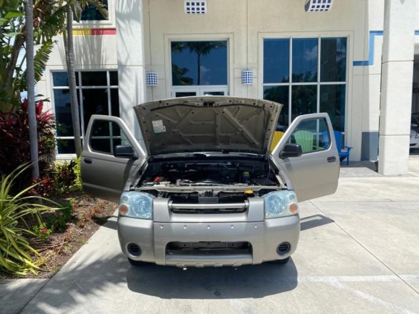 2004 Radiant Silver Metallic /Gray Nissan Frontier 2WD XE LOW MILES 70,508 (1N6DD26T74C) with an 2.4L DOHC SMPI 16-Valve 4-Cyl Engine engine, Manual transmission, located at 4701 North Dixie Hwy, Pompano Beach, FL, 33064, (954) 422-2889, 26.240938, -80.123474 - OUR WEBPAGE FLORIDACARS1.COM HAS OVER 100 PHOTOS AND FREE CARFAX LINK 2004 NISSAN FRONTIER VIN: 1N6DD26T74C451236 CLUB CAB PICKUP 2.4L I4 F DOHC 16V GASOLINE REAR WHEEL DRIVE Top Features Bed Liner Cloth Seats Basic Features ABS Brakes AM/FM Stereo Air Conditioning CD Audio Manual Transmission Power - Photo#16