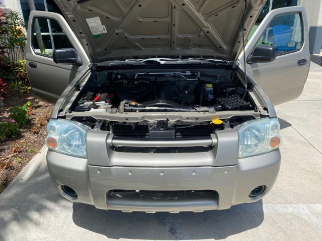 2004 Radiant Silver Metallic /Gray Nissan Frontier 2WD XE LOW MILES 70,694 (1N6DD26T74C) with an 2.4L DOHC SMPI 16-Valve 4-Cyl Engine engine, Manual transmission, located at 4701 North Dixie Hwy, Pompano Beach, FL, 33064, (954) 422-2889, 26.240938, -80.123474 - OUR WEBPAGE FLORIDACARS1.COM HAS OVER 100 PHOTOS AND FREE CARFAX LINK 2004 NISSAN FRONTIER VIN: 1N6DD26T74C451236 CLUB CAB PICKUP 2.4L I4 F DOHC 16V GASOLINE REAR WHEEL DRIVE Top Features Bed Liner Cloth Seats Basic Features ABS Brakes AM/FM Stereo Air Conditioning CD Audio Manual Transmission Power - Photo#17