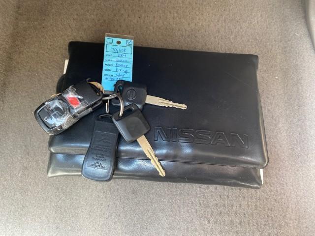 2004 Radiant Silver Metallic /Gray Nissan Frontier 2WD XE LOW MILES 70,694 (1N6DD26T74C) with an 2.4L DOHC SMPI 16-Valve 4-Cyl Engine engine, Manual transmission, located at 4701 North Dixie Hwy, Pompano Beach, FL, 33064, (954) 422-2889, 26.240938, -80.123474 - OUR WEBPAGE FLORIDACARS1.COM HAS OVER 100 PHOTOS AND FREE CARFAX LINK 2004 NISSAN FRONTIER VIN: 1N6DD26T74C451236 CLUB CAB PICKUP 2.4L I4 F DOHC 16V GASOLINE REAR WHEEL DRIVE Top Features Bed Liner Cloth Seats Basic Features ABS Brakes AM/FM Stereo Air Conditioning CD Audio Manual Transmission Power - Photo#23