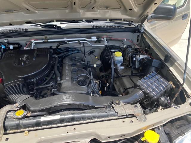 2004 Radiant Silver Metallic /Gray Nissan Frontier 2WD XE LOW MILES 70,694 (1N6DD26T74C) with an 2.4L DOHC SMPI 16-Valve 4-Cyl Engine engine, Manual transmission, located at 4701 North Dixie Hwy, Pompano Beach, FL, 33064, (954) 422-2889, 26.240938, -80.123474 - OUR WEBPAGE FLORIDACARS1.COM HAS OVER 100 PHOTOS AND FREE CARFAX LINK 2004 NISSAN FRONTIER VIN: 1N6DD26T74C451236 CLUB CAB PICKUP 2.4L I4 F DOHC 16V GASOLINE REAR WHEEL DRIVE Top Features Bed Liner Cloth Seats Basic Features ABS Brakes AM/FM Stereo Air Conditioning CD Audio Manual Transmission Power - Photo#26