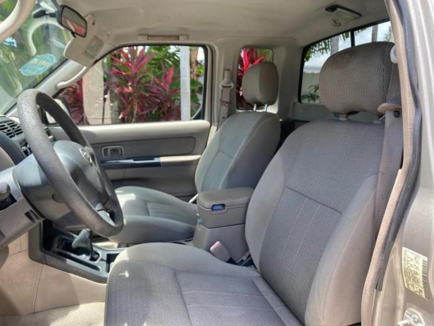 2004 Radiant Silver Metallic /Gray Nissan Frontier 2WD XE LOW MILES 70,508 (1N6DD26T74C) with an 2.4L DOHC SMPI 16-Valve 4-Cyl Engine engine, Manual transmission, located at 4701 North Dixie Hwy, Pompano Beach, FL, 33064, (954) 422-2889, 26.240938, -80.123474 - OUR WEBPAGE FLORIDACARS1.COM HAS OVER 100 PHOTOS AND FREE CARFAX LINK 2004 NISSAN FRONTIER VIN: 1N6DD26T74C451236 CLUB CAB PICKUP 2.4L I4 F DOHC 16V GASOLINE REAR WHEEL DRIVE Top Features Bed Liner Cloth Seats Basic Features ABS Brakes AM/FM Stereo Air Conditioning CD Audio Manual Transmission Power - Photo#33
