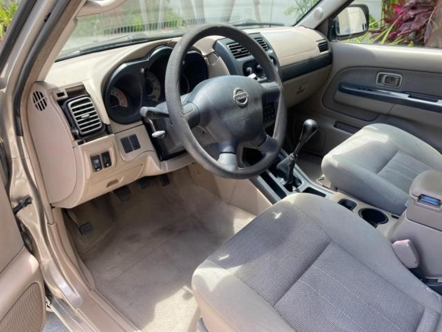 2004 Radiant Silver Metallic /Gray Nissan Frontier 2WD XE LOW MILES 70,508 (1N6DD26T74C) with an 2.4L DOHC SMPI 16-Valve 4-Cyl Engine engine, Manual transmission, located at 4701 North Dixie Hwy, Pompano Beach, FL, 33064, (954) 422-2889, 26.240938, -80.123474 - OUR WEBPAGE FLORIDACARS1.COM HAS OVER 100 PHOTOS AND FREE CARFAX LINK 2004 NISSAN FRONTIER VIN: 1N6DD26T74C451236 CLUB CAB PICKUP 2.4L I4 F DOHC 16V GASOLINE REAR WHEEL DRIVE Top Features Bed Liner Cloth Seats Basic Features ABS Brakes AM/FM Stereo Air Conditioning CD Audio Manual Transmission Power - Photo#37