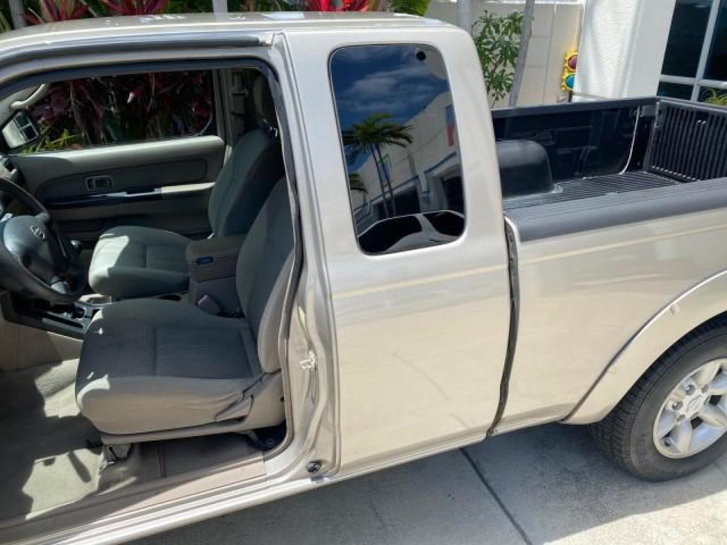 2004 Radiant Silver Metallic /Gray Nissan Frontier 2WD XE LOW MILES 70,508 (1N6DD26T74C) with an 2.4L DOHC SMPI 16-Valve 4-Cyl Engine engine, Manual transmission, located at 4701 North Dixie Hwy, Pompano Beach, FL, 33064, (954) 422-2889, 26.240938, -80.123474 - OUR WEBPAGE FLORIDACARS1.COM HAS OVER 100 PHOTOS AND FREE CARFAX LINK 2004 NISSAN FRONTIER VIN: 1N6DD26T74C451236 CLUB CAB PICKUP 2.4L I4 F DOHC 16V GASOLINE REAR WHEEL DRIVE Top Features Bed Liner Cloth Seats Basic Features ABS Brakes AM/FM Stereo Air Conditioning CD Audio Manual Transmission Power - Photo#57