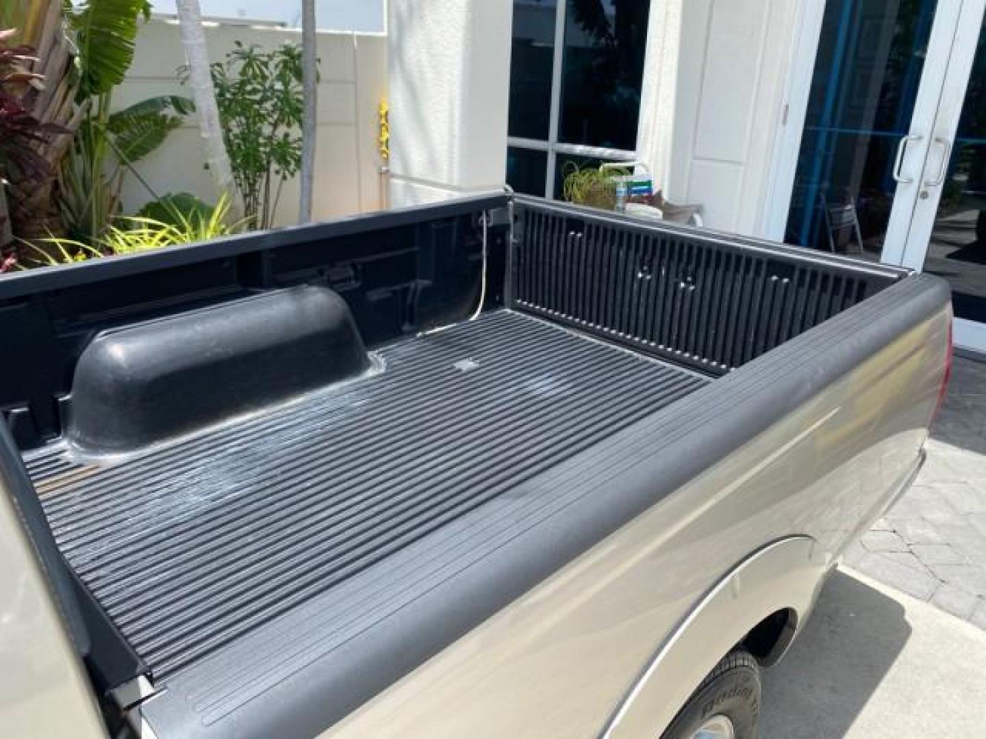 2004 Radiant Silver Metallic /Gray Nissan Frontier 2WD XE LOW MILES 70,508 (1N6DD26T74C) with an 2.4L DOHC SMPI 16-Valve 4-Cyl Engine engine, Manual transmission, located at 4701 North Dixie Hwy, Pompano Beach, FL, 33064, (954) 422-2889, 26.240938, -80.123474 - OUR WEBPAGE FLORIDACARS1.COM HAS OVER 100 PHOTOS AND FREE CARFAX LINK 2004 NISSAN FRONTIER VIN: 1N6DD26T74C451236 CLUB CAB PICKUP 2.4L I4 F DOHC 16V GASOLINE REAR WHEEL DRIVE Top Features Bed Liner Cloth Seats Basic Features ABS Brakes AM/FM Stereo Air Conditioning CD Audio Manual Transmission Power - Photo#60