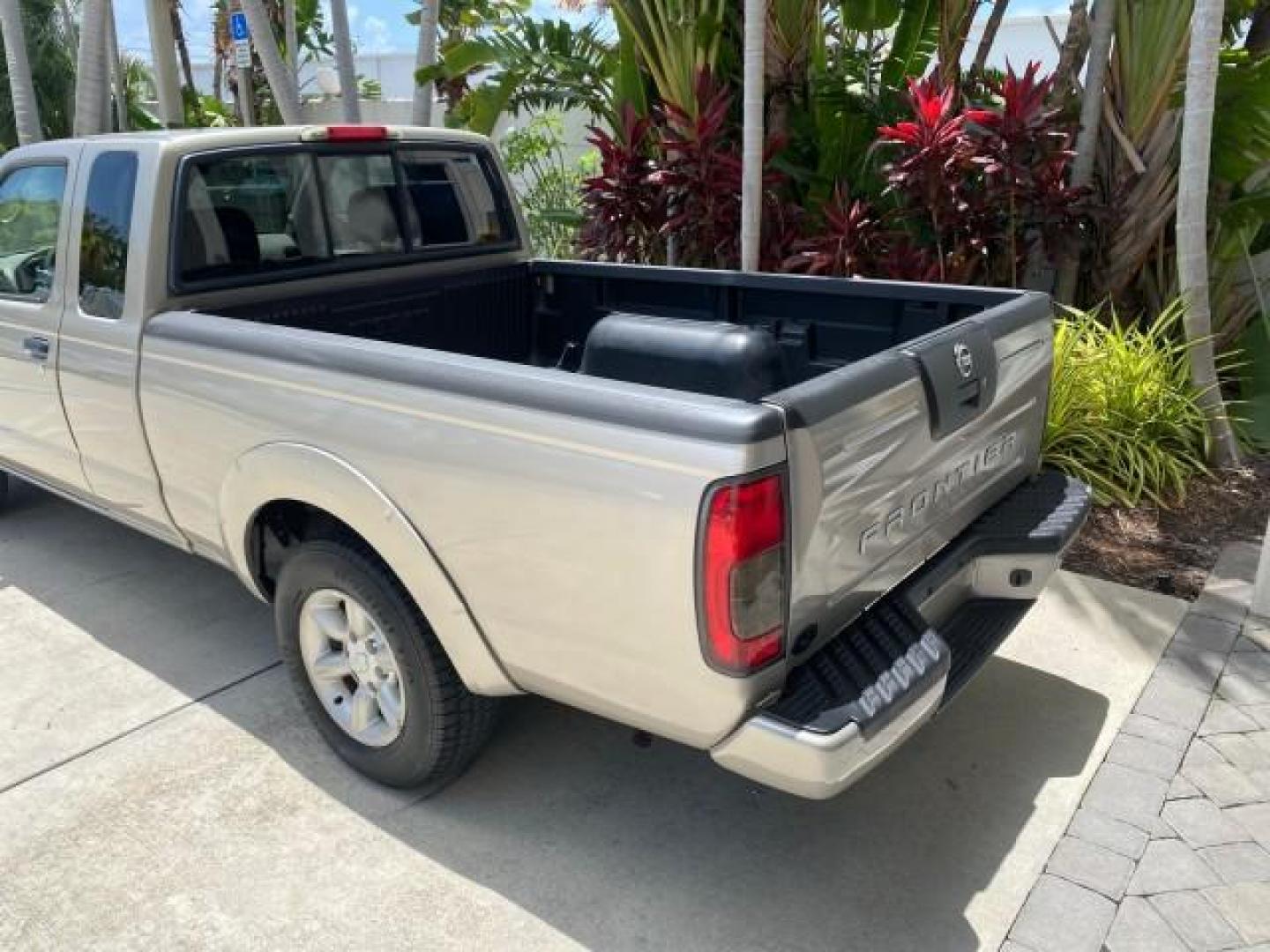 2004 Radiant Silver Metallic /Gray Nissan Frontier 2WD XE LOW MILES 70,508 (1N6DD26T74C) with an 2.4L DOHC SMPI 16-Valve 4-Cyl Engine engine, Manual transmission, located at 4701 North Dixie Hwy, Pompano Beach, FL, 33064, (954) 422-2889, 26.240938, -80.123474 - OUR WEBPAGE FLORIDACARS1.COM HAS OVER 100 PHOTOS AND FREE CARFAX LINK 2004 NISSAN FRONTIER VIN: 1N6DD26T74C451236 CLUB CAB PICKUP 2.4L I4 F DOHC 16V GASOLINE REAR WHEEL DRIVE Top Features Bed Liner Cloth Seats Basic Features ABS Brakes AM/FM Stereo Air Conditioning CD Audio Manual Transmission Power - Photo#61