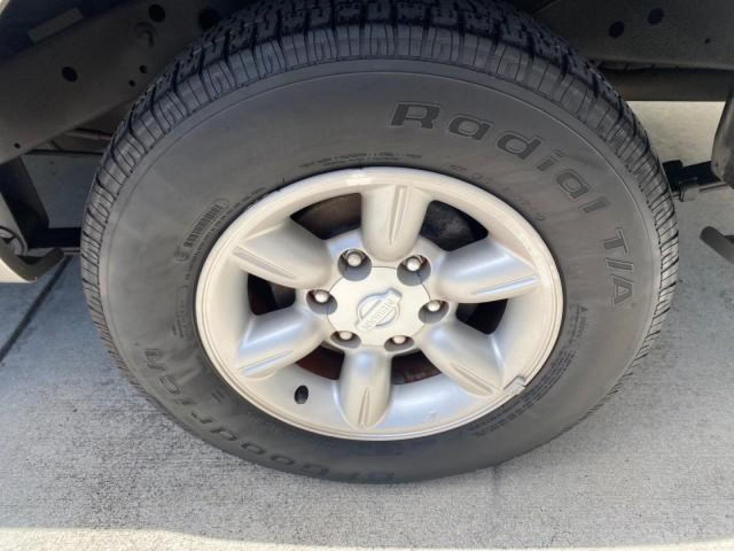 2004 Radiant Silver Metallic /Gray Nissan Frontier 2WD XE LOW MILES 70,508 (1N6DD26T74C) with an 2.4L DOHC SMPI 16-Valve 4-Cyl Engine engine, Manual transmission, located at 4701 North Dixie Hwy, Pompano Beach, FL, 33064, (954) 422-2889, 26.240938, -80.123474 - OUR WEBPAGE FLORIDACARS1.COM HAS OVER 100 PHOTOS AND FREE CARFAX LINK 2004 NISSAN FRONTIER VIN: 1N6DD26T74C451236 CLUB CAB PICKUP 2.4L I4 F DOHC 16V GASOLINE REAR WHEEL DRIVE Top Features Bed Liner Cloth Seats Basic Features ABS Brakes AM/FM Stereo Air Conditioning CD Audio Manual Transmission Power - Photo#63