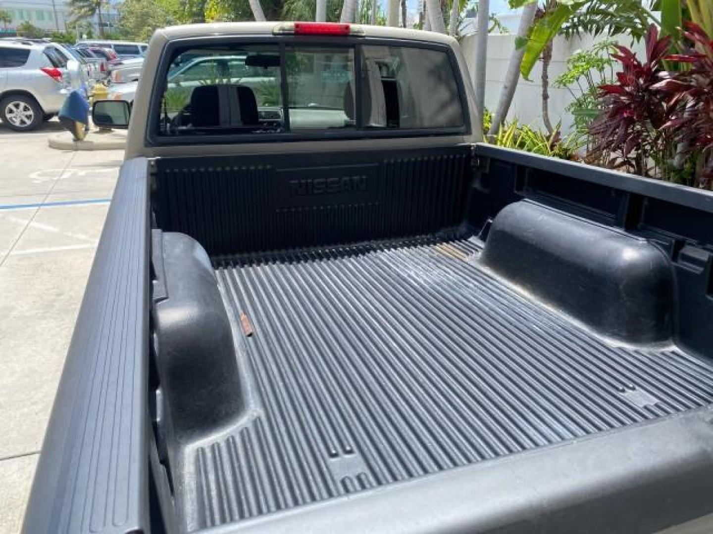 2004 Radiant Silver Metallic /Gray Nissan Frontier 2WD XE LOW MILES 70,508 (1N6DD26T74C) with an 2.4L DOHC SMPI 16-Valve 4-Cyl Engine engine, Manual transmission, located at 4701 North Dixie Hwy, Pompano Beach, FL, 33064, (954) 422-2889, 26.240938, -80.123474 - OUR WEBPAGE FLORIDACARS1.COM HAS OVER 100 PHOTOS AND FREE CARFAX LINK 2004 NISSAN FRONTIER VIN: 1N6DD26T74C451236 CLUB CAB PICKUP 2.4L I4 F DOHC 16V GASOLINE REAR WHEEL DRIVE Top Features Bed Liner Cloth Seats Basic Features ABS Brakes AM/FM Stereo Air Conditioning CD Audio Manual Transmission Power - Photo#65