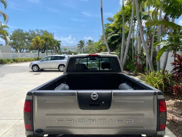 2004 Radiant Silver Metallic /Gray Nissan Frontier 2WD XE LOW MILES 70,694 (1N6DD26T74C) with an 2.4L DOHC SMPI 16-Valve 4-Cyl Engine engine, Manual transmission, located at 4701 North Dixie Hwy, Pompano Beach, FL, 33064, (954) 422-2889, 26.240938, -80.123474 - OUR WEBPAGE FLORIDACARS1.COM HAS OVER 100 PHOTOS AND FREE CARFAX LINK 2004 NISSAN FRONTIER VIN: 1N6DD26T74C451236 CLUB CAB PICKUP 2.4L I4 F DOHC 16V GASOLINE REAR WHEEL DRIVE Top Features Bed Liner Cloth Seats Basic Features ABS Brakes AM/FM Stereo Air Conditioning CD Audio Manual Transmission Power - Photo#66