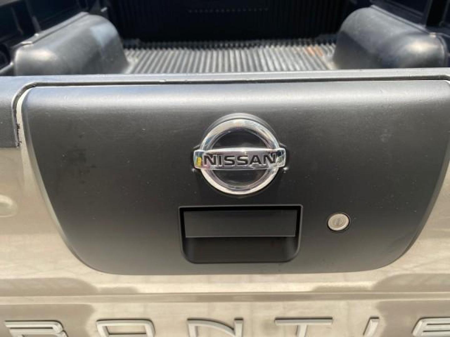 2004 Radiant Silver Metallic /Gray Nissan Frontier 2WD XE LOW MILES 70,508 (1N6DD26T74C) with an 2.4L DOHC SMPI 16-Valve 4-Cyl Engine engine, Manual transmission, located at 4701 North Dixie Hwy, Pompano Beach, FL, 33064, (954) 422-2889, 26.240938, -80.123474 - OUR WEBPAGE FLORIDACARS1.COM HAS OVER 100 PHOTOS AND FREE CARFAX LINK 2004 NISSAN FRONTIER VIN: 1N6DD26T74C451236 CLUB CAB PICKUP 2.4L I4 F DOHC 16V GASOLINE REAR WHEEL DRIVE Top Features Bed Liner Cloth Seats Basic Features ABS Brakes AM/FM Stereo Air Conditioning CD Audio Manual Transmission Power - Photo#67