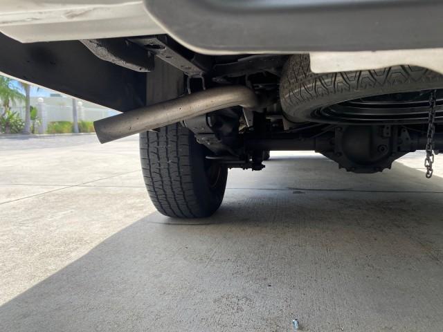 2004 Radiant Silver Metallic /Gray Nissan Frontier 2WD XE LOW MILES 70,694 (1N6DD26T74C) with an 2.4L DOHC SMPI 16-Valve 4-Cyl Engine engine, Manual transmission, located at 4701 North Dixie Hwy, Pompano Beach, FL, 33064, (954) 422-2889, 26.240938, -80.123474 - OUR WEBPAGE FLORIDACARS1.COM HAS OVER 100 PHOTOS AND FREE CARFAX LINK 2004 NISSAN FRONTIER VIN: 1N6DD26T74C451236 CLUB CAB PICKUP 2.4L I4 F DOHC 16V GASOLINE REAR WHEEL DRIVE Top Features Bed Liner Cloth Seats Basic Features ABS Brakes AM/FM Stereo Air Conditioning CD Audio Manual Transmission Power - Photo#69