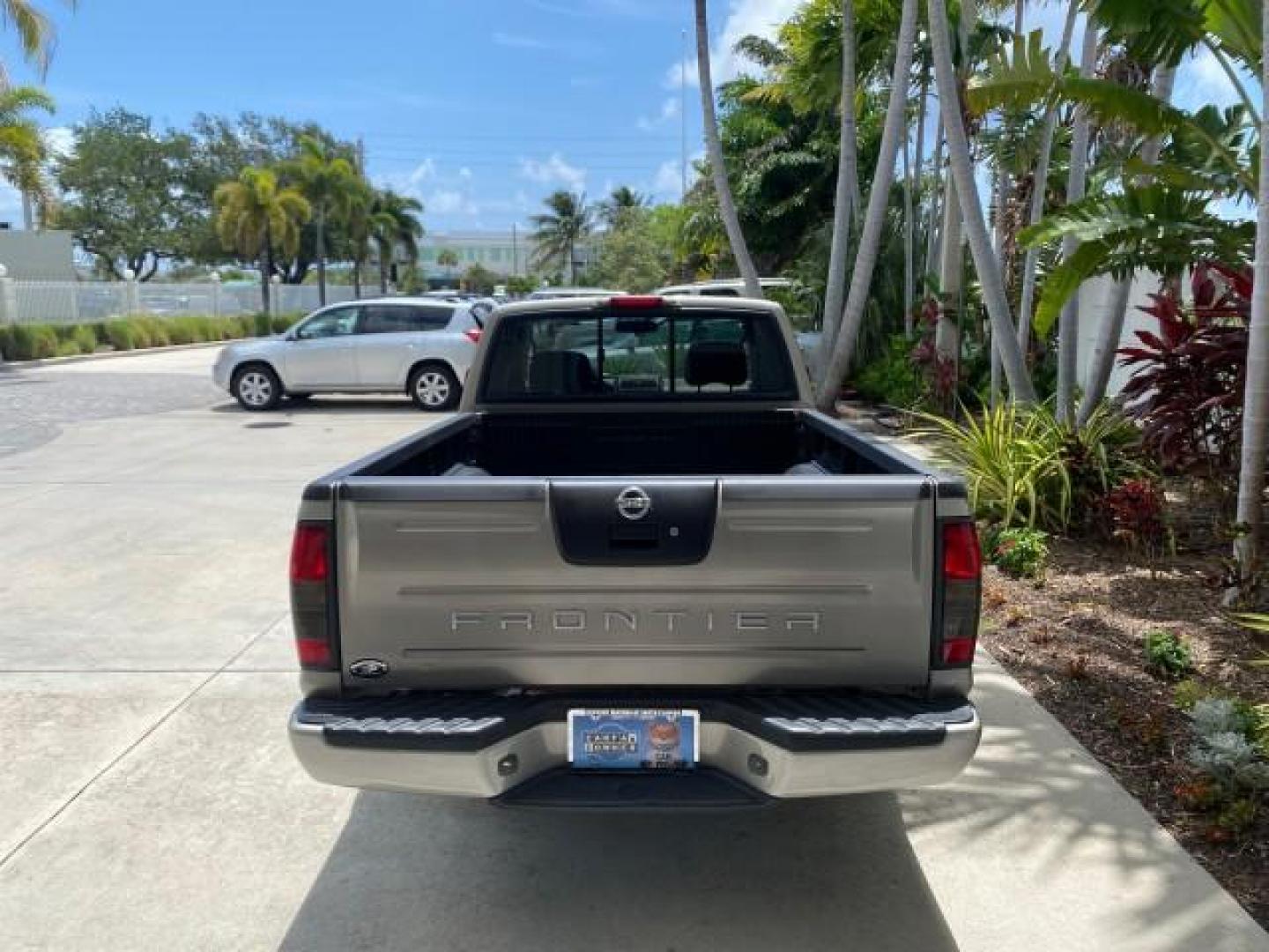 2004 Radiant Silver Metallic /Gray Nissan Frontier 2WD XE LOW MILES 70,508 (1N6DD26T74C) with an 2.4L DOHC SMPI 16-Valve 4-Cyl Engine engine, Manual transmission, located at 4701 North Dixie Hwy, Pompano Beach, FL, 33064, (954) 422-2889, 26.240938, -80.123474 - OUR WEBPAGE FLORIDACARS1.COM HAS OVER 100 PHOTOS AND FREE CARFAX LINK 2004 NISSAN FRONTIER VIN: 1N6DD26T74C451236 CLUB CAB PICKUP 2.4L I4 F DOHC 16V GASOLINE REAR WHEEL DRIVE Top Features Bed Liner Cloth Seats Basic Features ABS Brakes AM/FM Stereo Air Conditioning CD Audio Manual Transmission Power - Photo#70