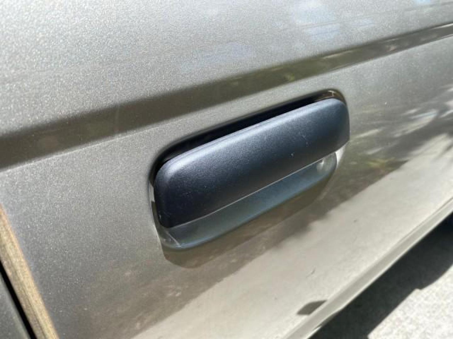 2004 Radiant Silver Metallic /Gray Nissan Frontier 2WD XE LOW MILES 70,508 (1N6DD26T74C) with an 2.4L DOHC SMPI 16-Valve 4-Cyl Engine engine, Manual transmission, located at 4701 North Dixie Hwy, Pompano Beach, FL, 33064, (954) 422-2889, 26.240938, -80.123474 - OUR WEBPAGE FLORIDACARS1.COM HAS OVER 100 PHOTOS AND FREE CARFAX LINK 2004 NISSAN FRONTIER VIN: 1N6DD26T74C451236 CLUB CAB PICKUP 2.4L I4 F DOHC 16V GASOLINE REAR WHEEL DRIVE Top Features Bed Liner Cloth Seats Basic Features ABS Brakes AM/FM Stereo Air Conditioning CD Audio Manual Transmission Power - Photo#84