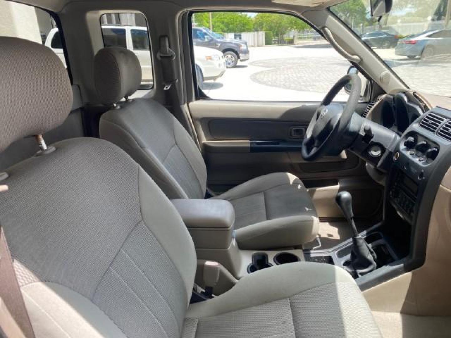 2004 Radiant Silver Metallic /Gray Nissan Frontier 2WD XE LOW MILES 70,508 (1N6DD26T74C) with an 2.4L DOHC SMPI 16-Valve 4-Cyl Engine engine, Manual transmission, located at 4701 North Dixie Hwy, Pompano Beach, FL, 33064, (954) 422-2889, 26.240938, -80.123474 - OUR WEBPAGE FLORIDACARS1.COM HAS OVER 100 PHOTOS AND FREE CARFAX LINK 2004 NISSAN FRONTIER VIN: 1N6DD26T74C451236 CLUB CAB PICKUP 2.4L I4 F DOHC 16V GASOLINE REAR WHEEL DRIVE Top Features Bed Liner Cloth Seats Basic Features ABS Brakes AM/FM Stereo Air Conditioning CD Audio Manual Transmission Power - Photo#88