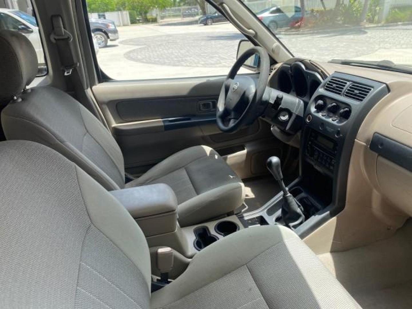 2004 Radiant Silver Metallic /Gray Nissan Frontier 2WD XE LOW MILES 70,508 (1N6DD26T74C) with an 2.4L DOHC SMPI 16-Valve 4-Cyl Engine engine, Manual transmission, located at 4701 North Dixie Hwy, Pompano Beach, FL, 33064, (954) 422-2889, 26.240938, -80.123474 - OUR WEBPAGE FLORIDACARS1.COM HAS OVER 100 PHOTOS AND FREE CARFAX LINK 2004 NISSAN FRONTIER VIN: 1N6DD26T74C451236 CLUB CAB PICKUP 2.4L I4 F DOHC 16V GASOLINE REAR WHEEL DRIVE Top Features Bed Liner Cloth Seats Basic Features ABS Brakes AM/FM Stereo Air Conditioning CD Audio Manual Transmission Power - Photo#89